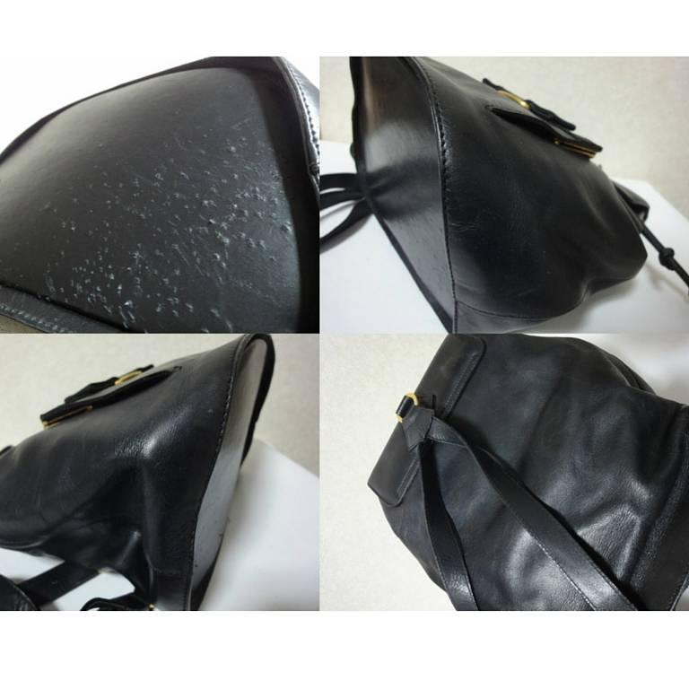 Vintage Salvatore Ferragamo black calf leather backpack from vara collection. 5