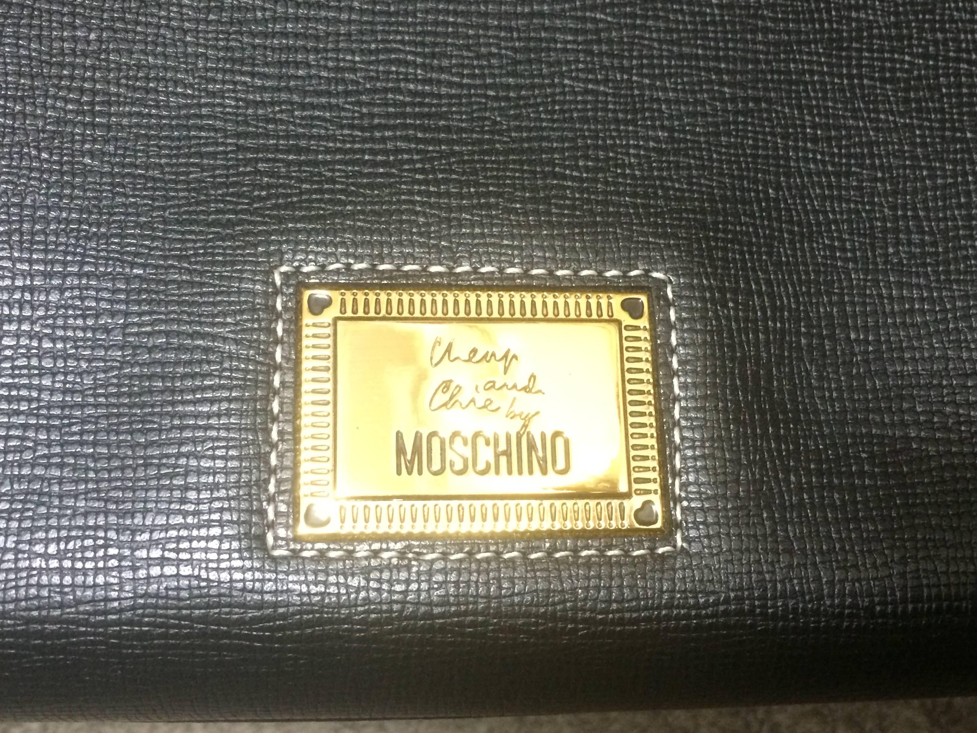 Women's Vintage MOSCHINO black leather tote bag in Kelly purse style with iconic M charm For Sale