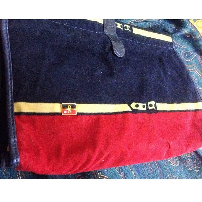 1980's Vintage Roberta di Camerino, Ambassador, red, navy, and beige velvet clutch purse, makeup, cosmetic pouch with golden R logo motif.

Introducing another cute and chic pouch from Ambassador by Roberta di Camerino, back in the
