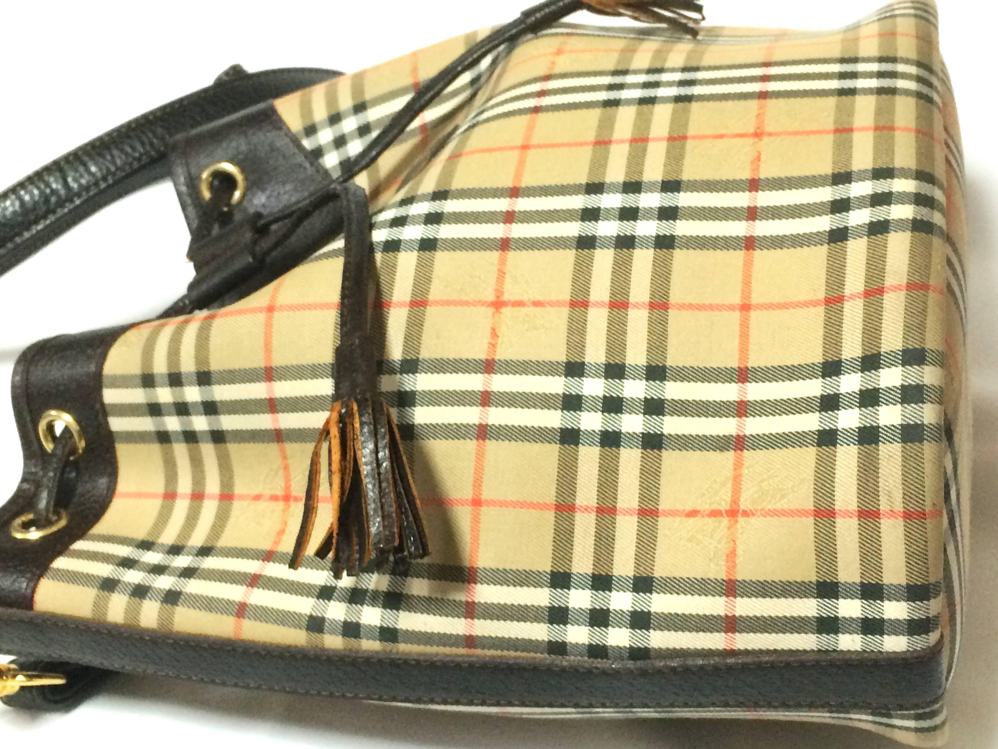 Women's or Men's 1980s. Vintage Burberry classic brown nova check hobo bucket shoulder bag.