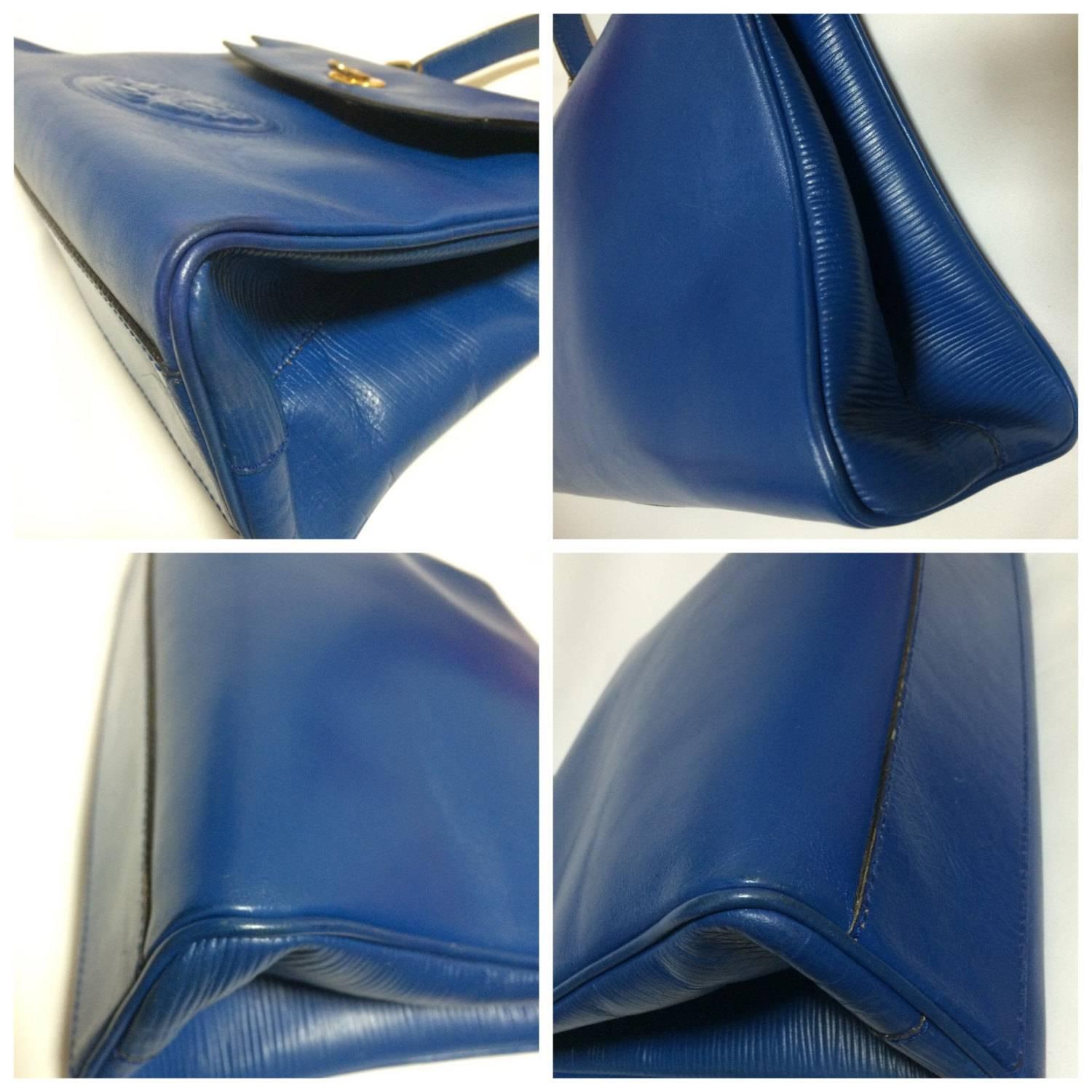 Vintage FENDI blue leather classic kelly style handbag with iconic Janus motif. For Sale 1