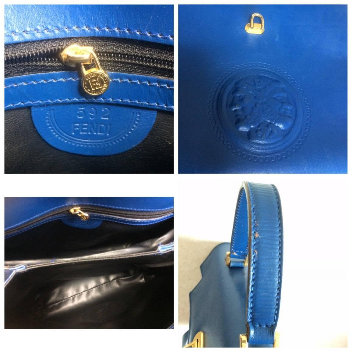 Vintage FENDI blue leather classic kelly style handbag with iconic Janus motif. For Sale 2