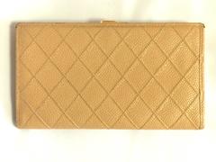 Vintage CHANEL beige caviar wallet with gold tone CC motif. Classic purse.