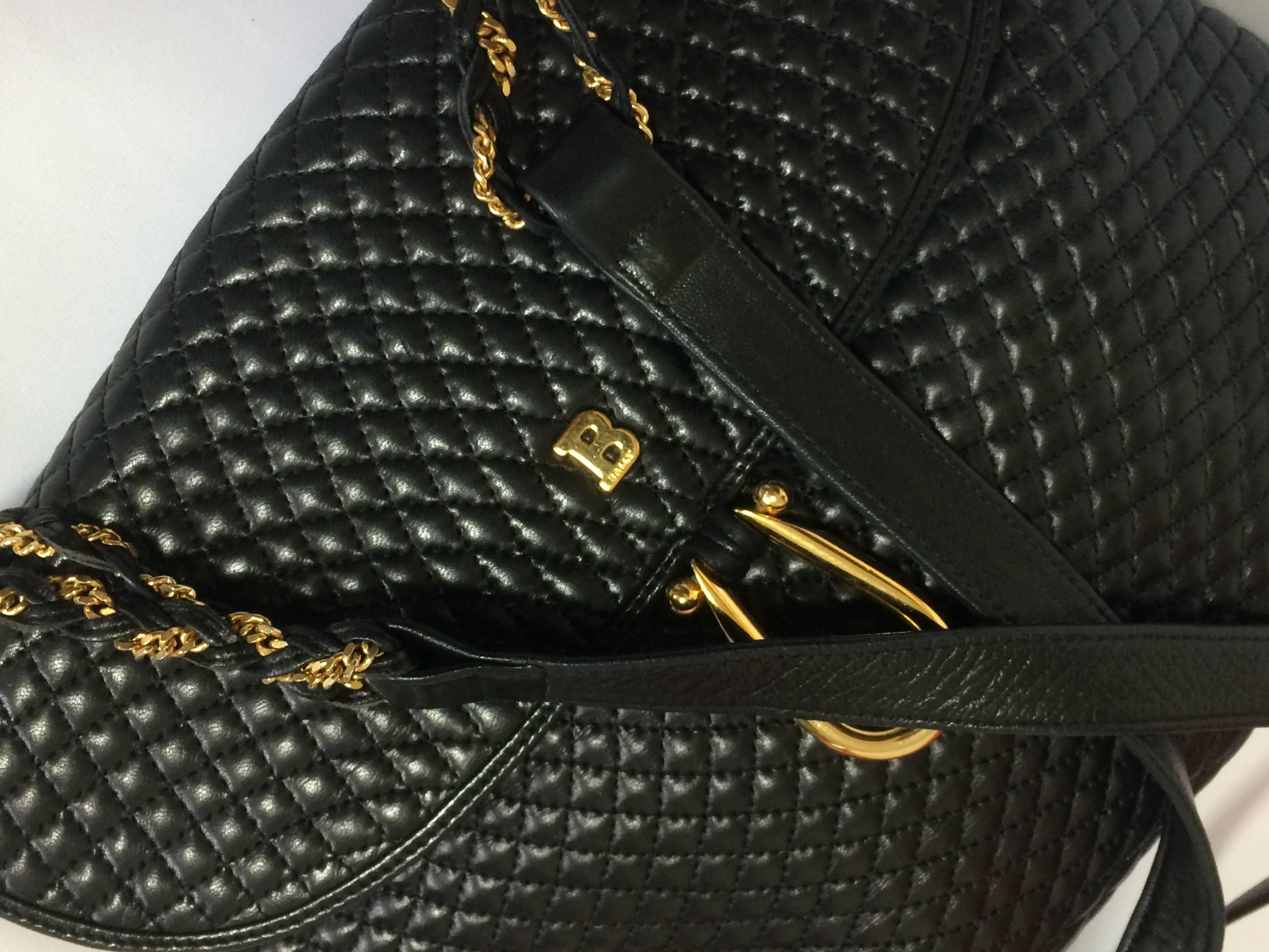 black quilted purse with chain strap