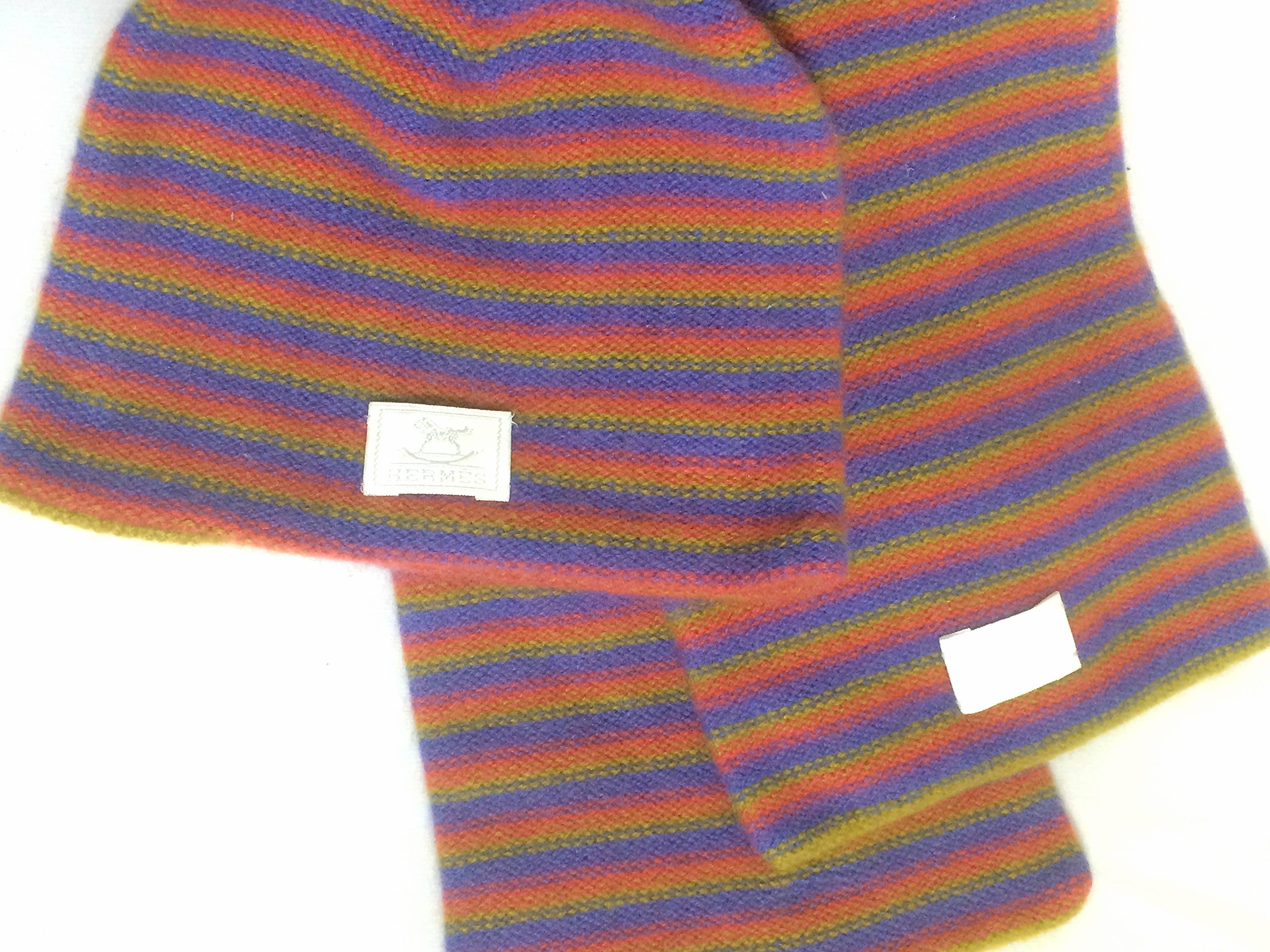 MINT/excellent condition!
***Please note, these are for Kids/Babies. ***

Hermes 100% Cashmere knit kids/baby scarf and cap/hat in multiple color stripe in purple, olive yellow, and pink. Made in Italy. Unisex kids/babies.

This is a 100%