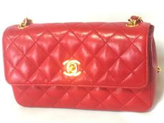 Vintage CHANEL classic mini flap 2.55 shoulder bag in lipstick red lambskin.