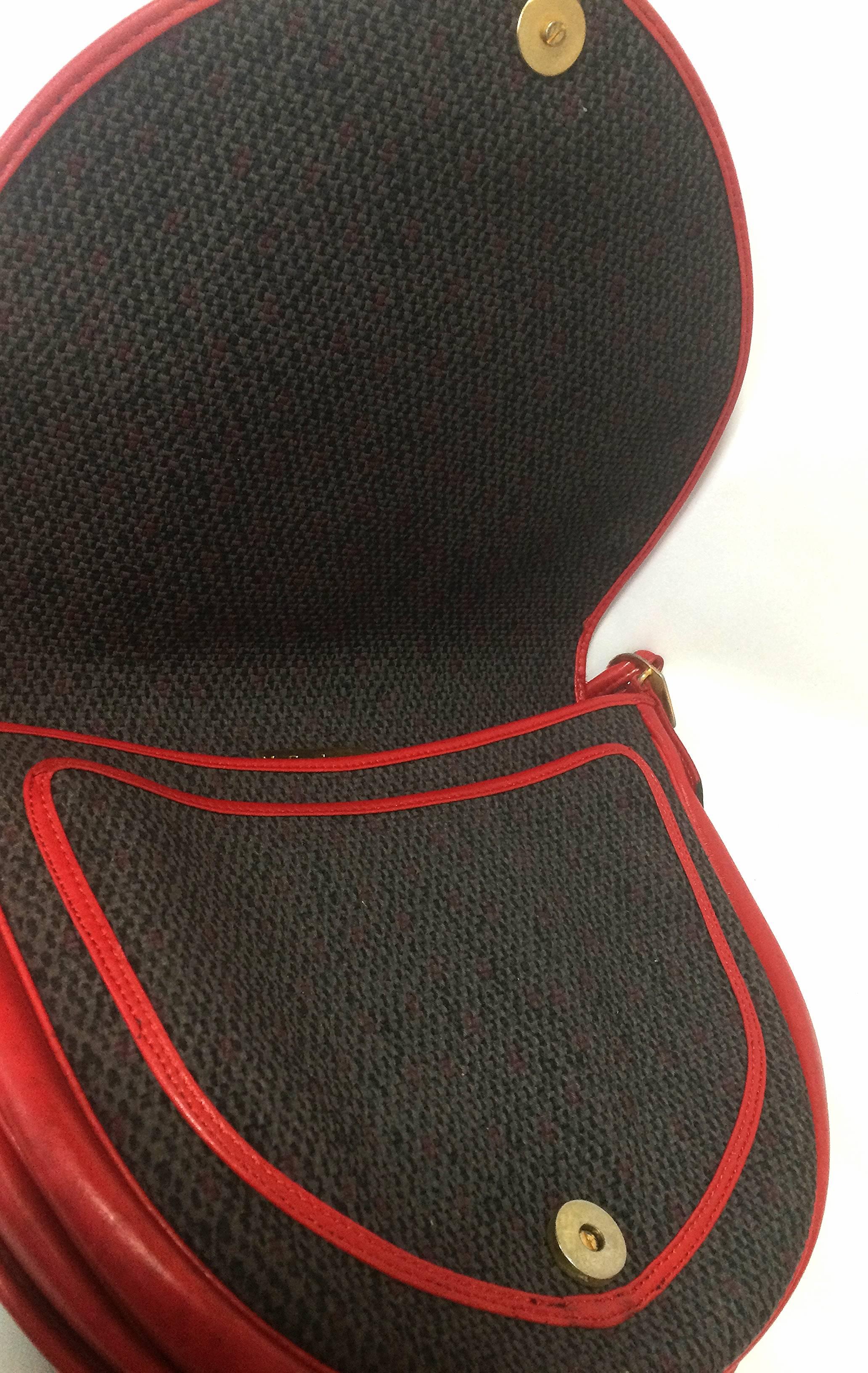 Vintage Yves Saint Laurent oval navy shoulder bag with red shoulder straps. In Good Condition For Sale In Kashiwa, Chiba