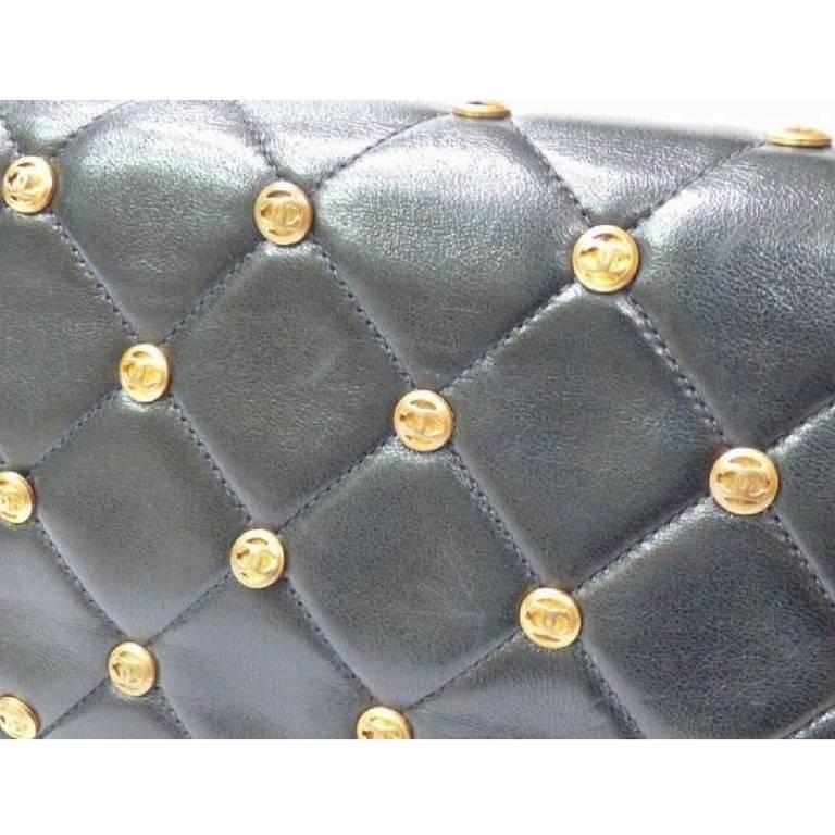 1990s. Vintage CHANEL black lambskin 2.55 shoulder bag with golden round cc marks. Rare masterpiece.

Introducing one of the rarest vintage bags from CHANEL back in the 90's.
Classic black 2.55 lambskin shoulder bag but featuring round small CC