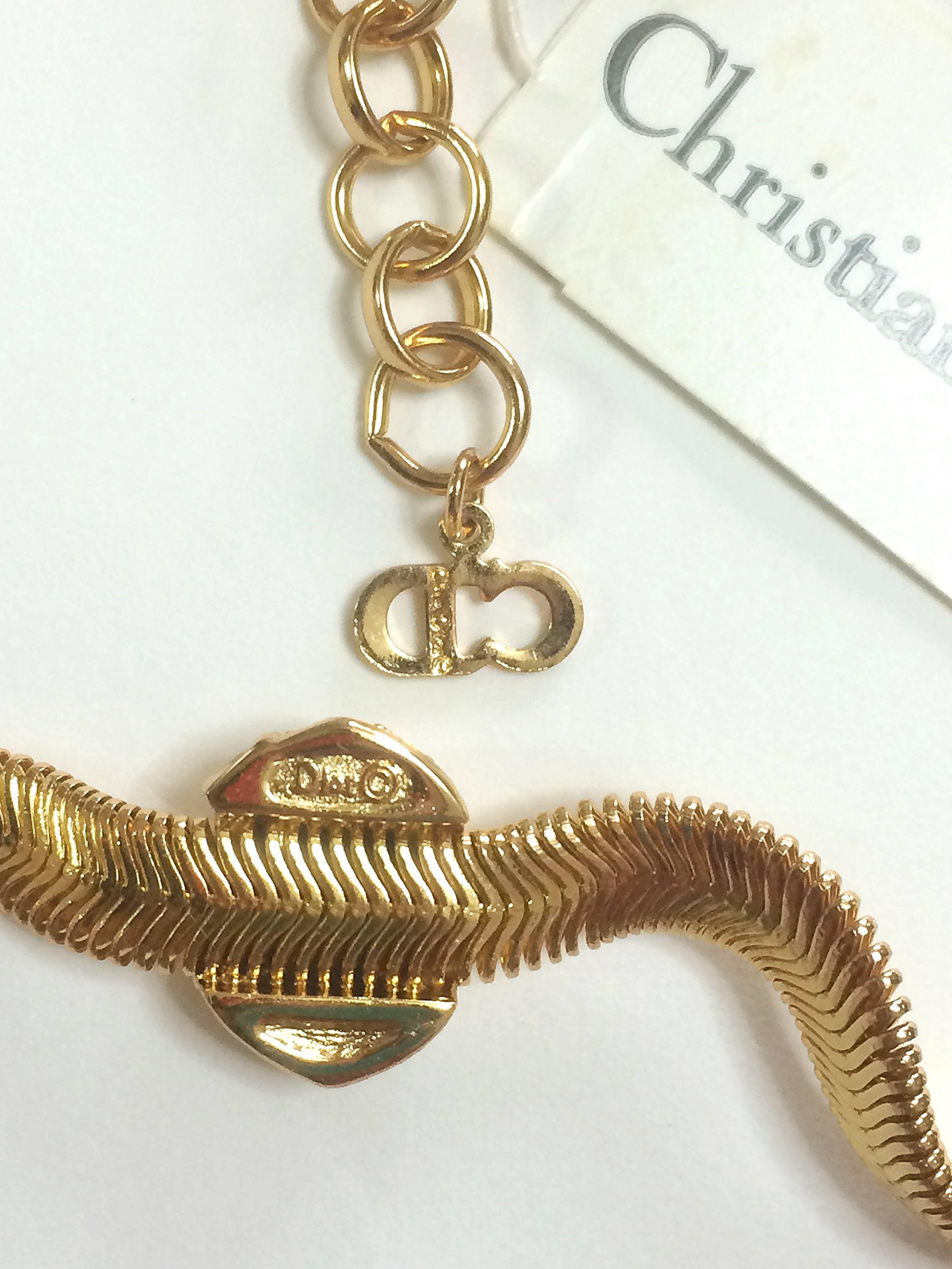 Women's or Men's MINT. NEW.Vintage Christian Dior golden flat snake chain necklace with crystals For Sale