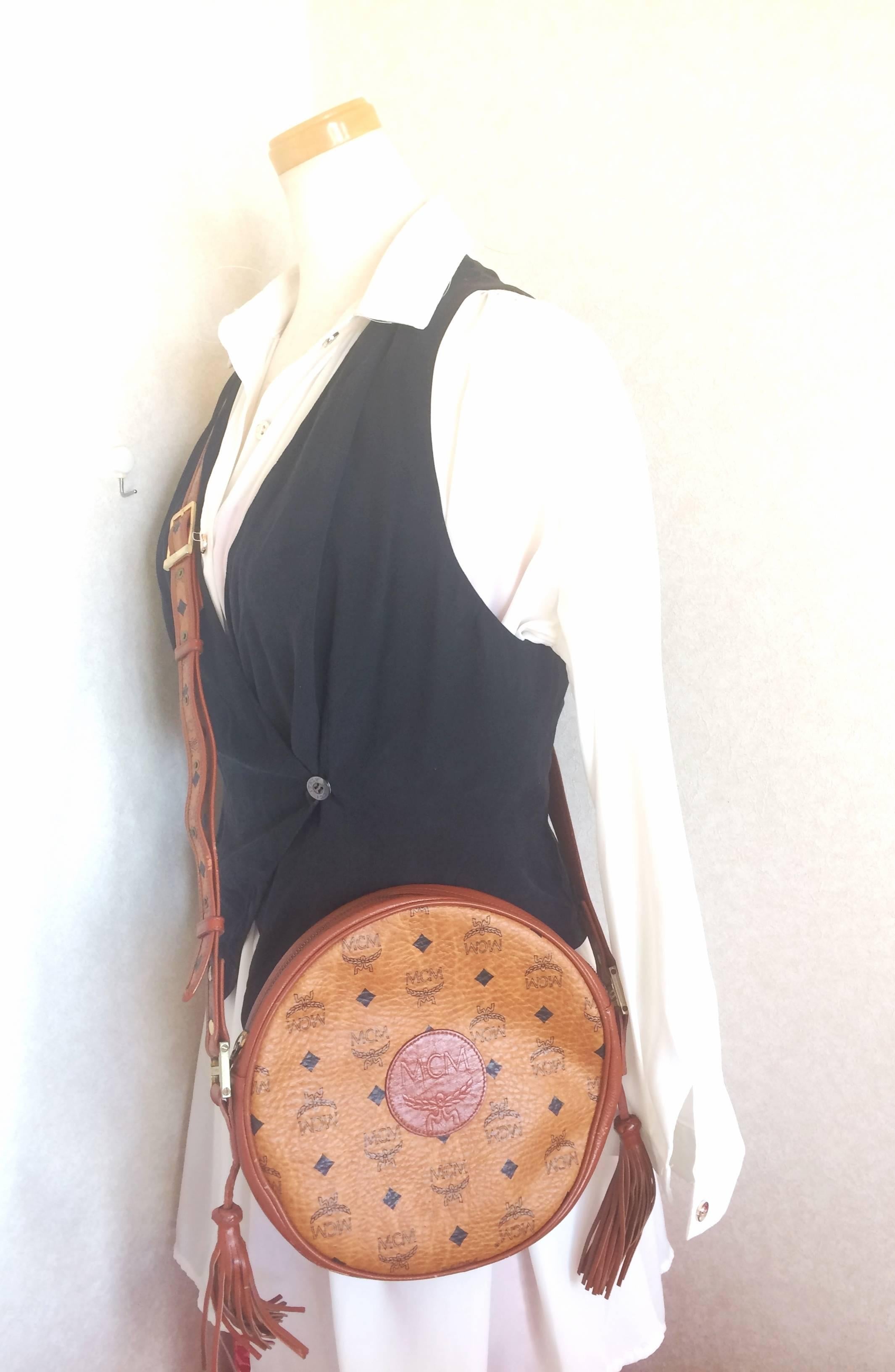 Vintage MCM rare brown monogram round shoulder bag with brown leather trimmings. For Sale 2