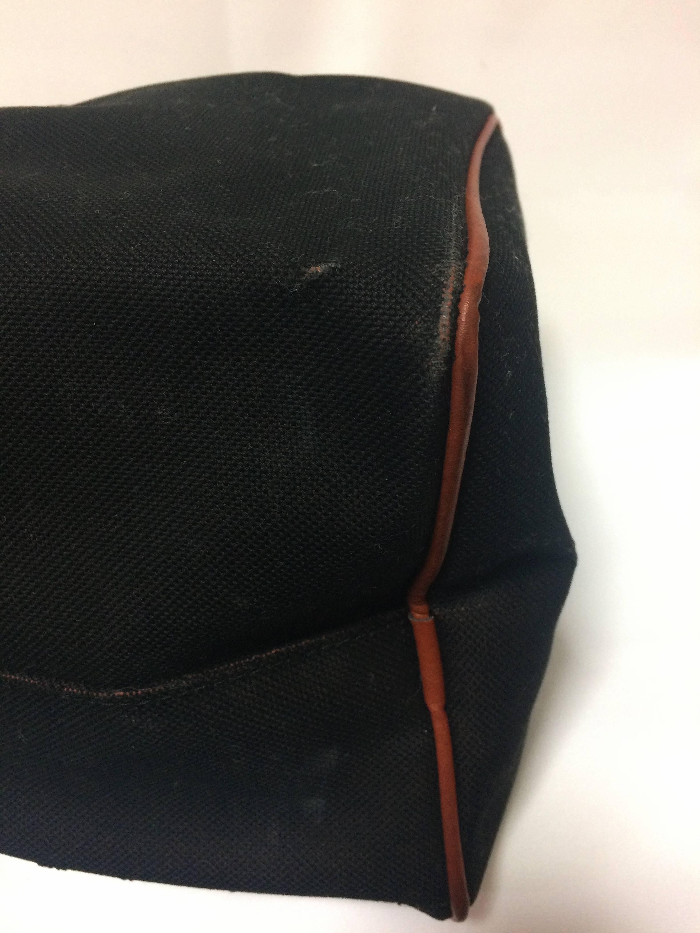 Black Vintage Yves Saint Laurent black and brown canvas duffle handbag, travel bag