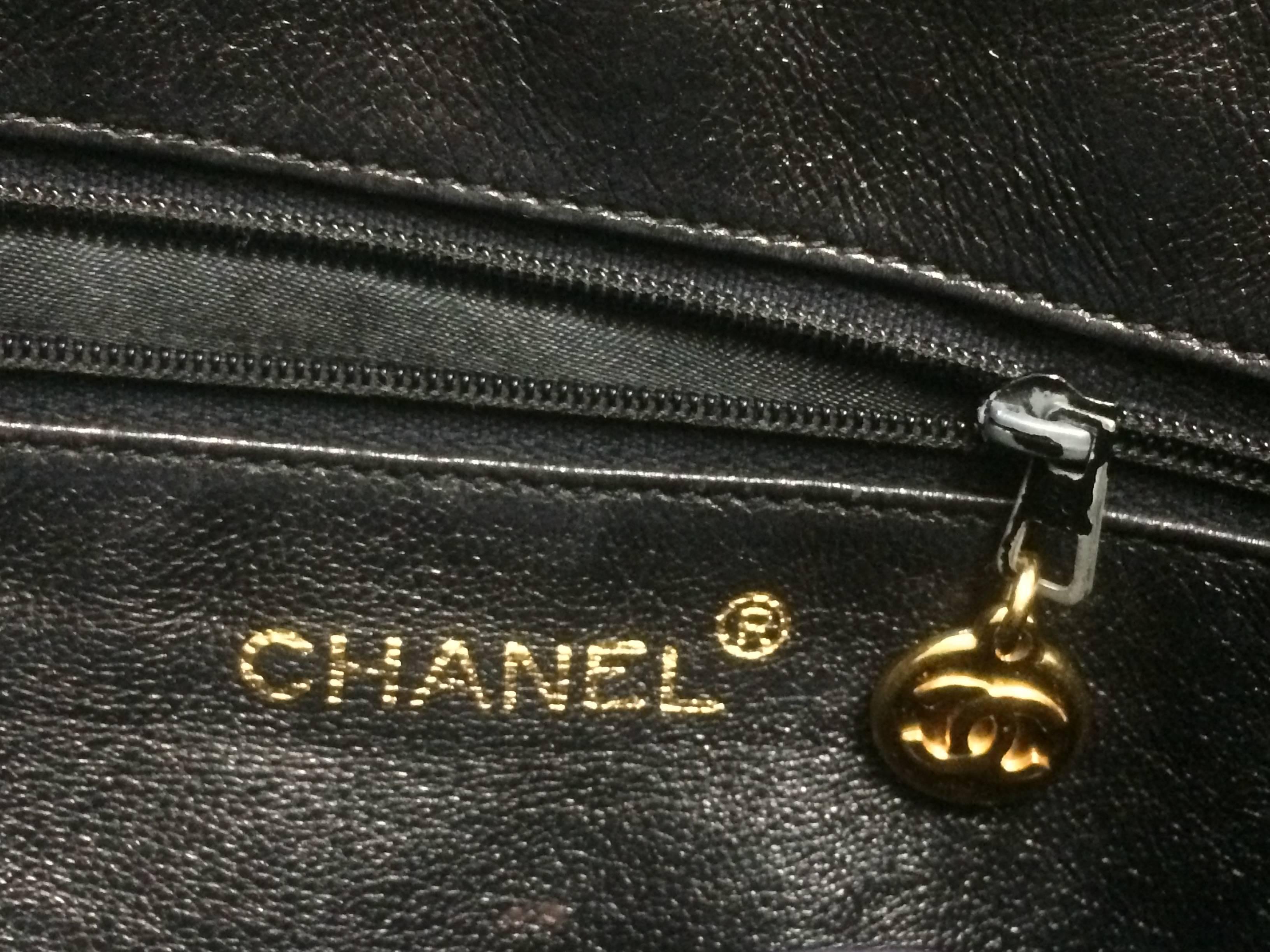 Vintage Chanel black large camera bag style chain shoulder bag with a CC fringe 3
