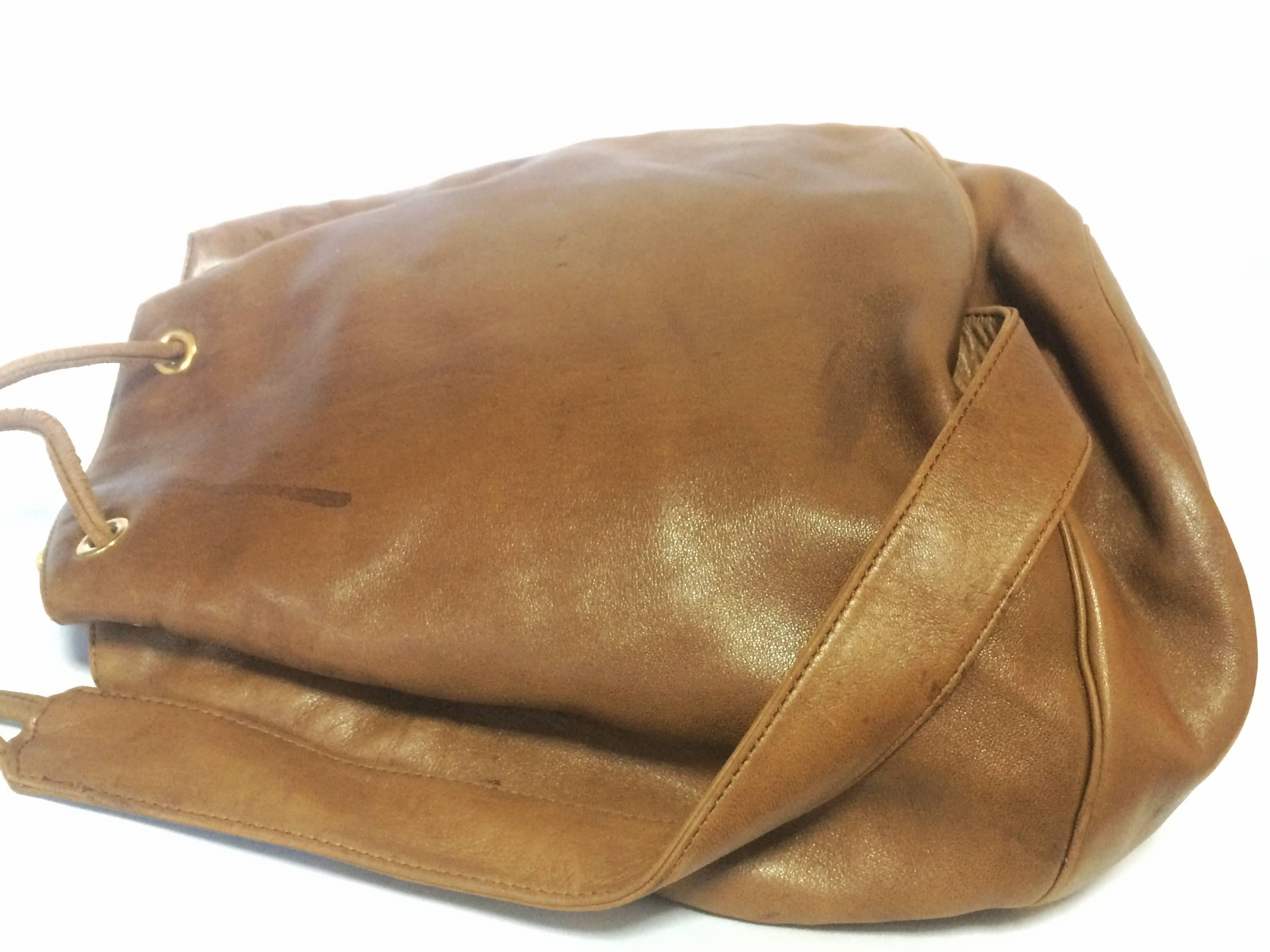 Brown Vintage Christian Dior brown nappa leather backpack design, large hobo bag. For Sale