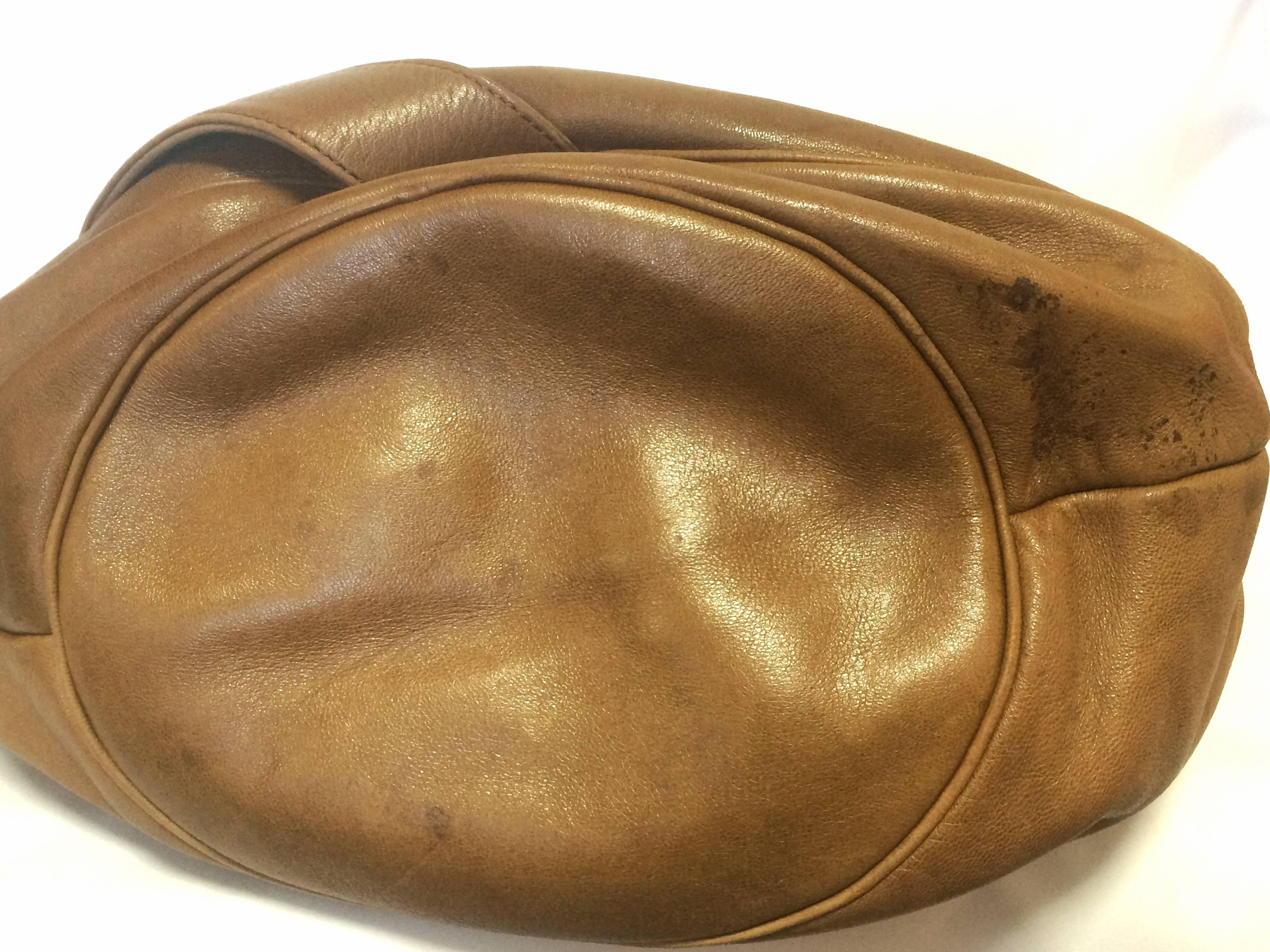 Women's or Men's Vintage Christian Dior brown nappa leather backpack design, large hobo bag. For Sale