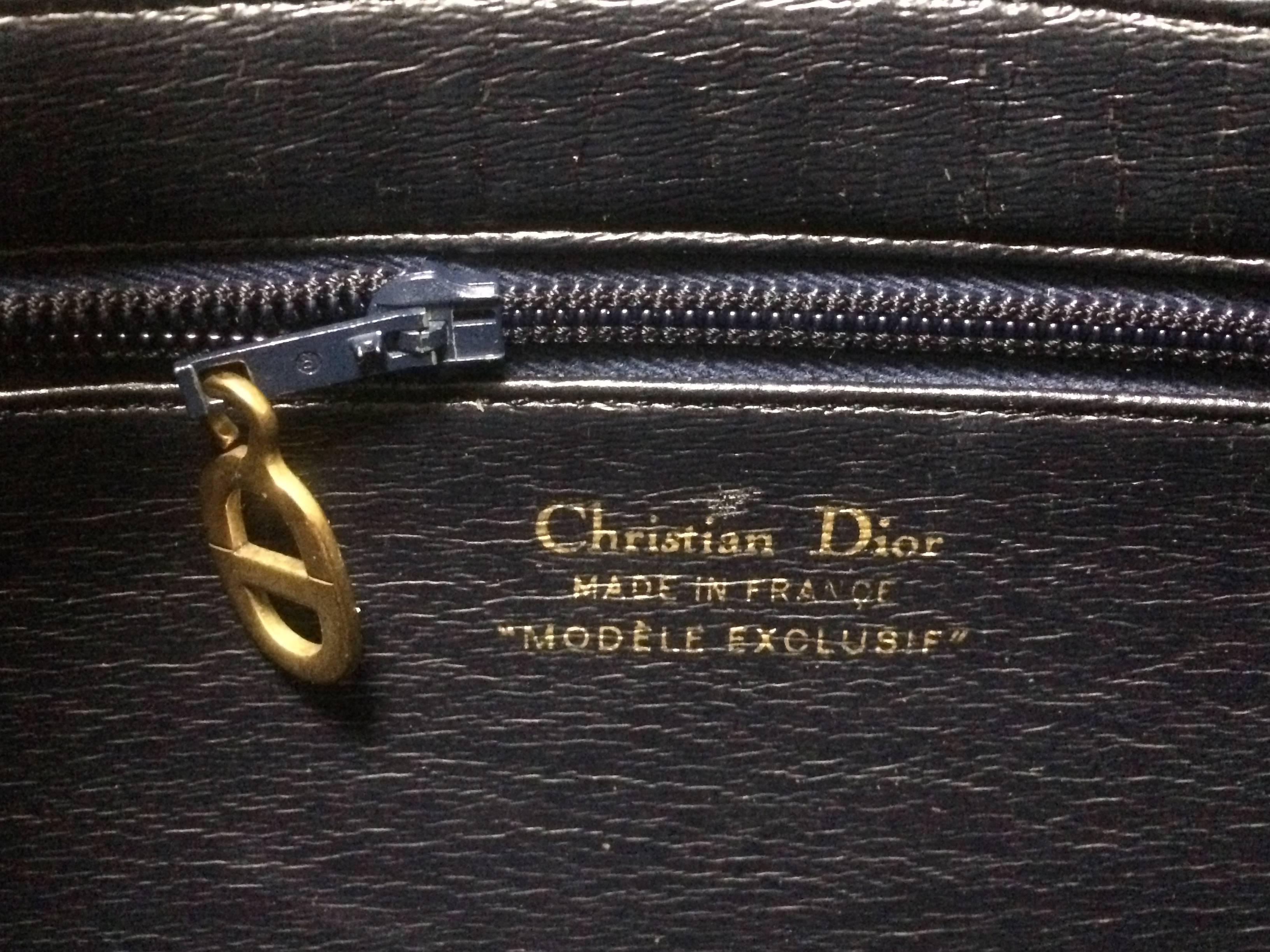 Vintage Christian Dior navy leather shoulder bag with CD motif. MODELE EXCLUSIF 1
