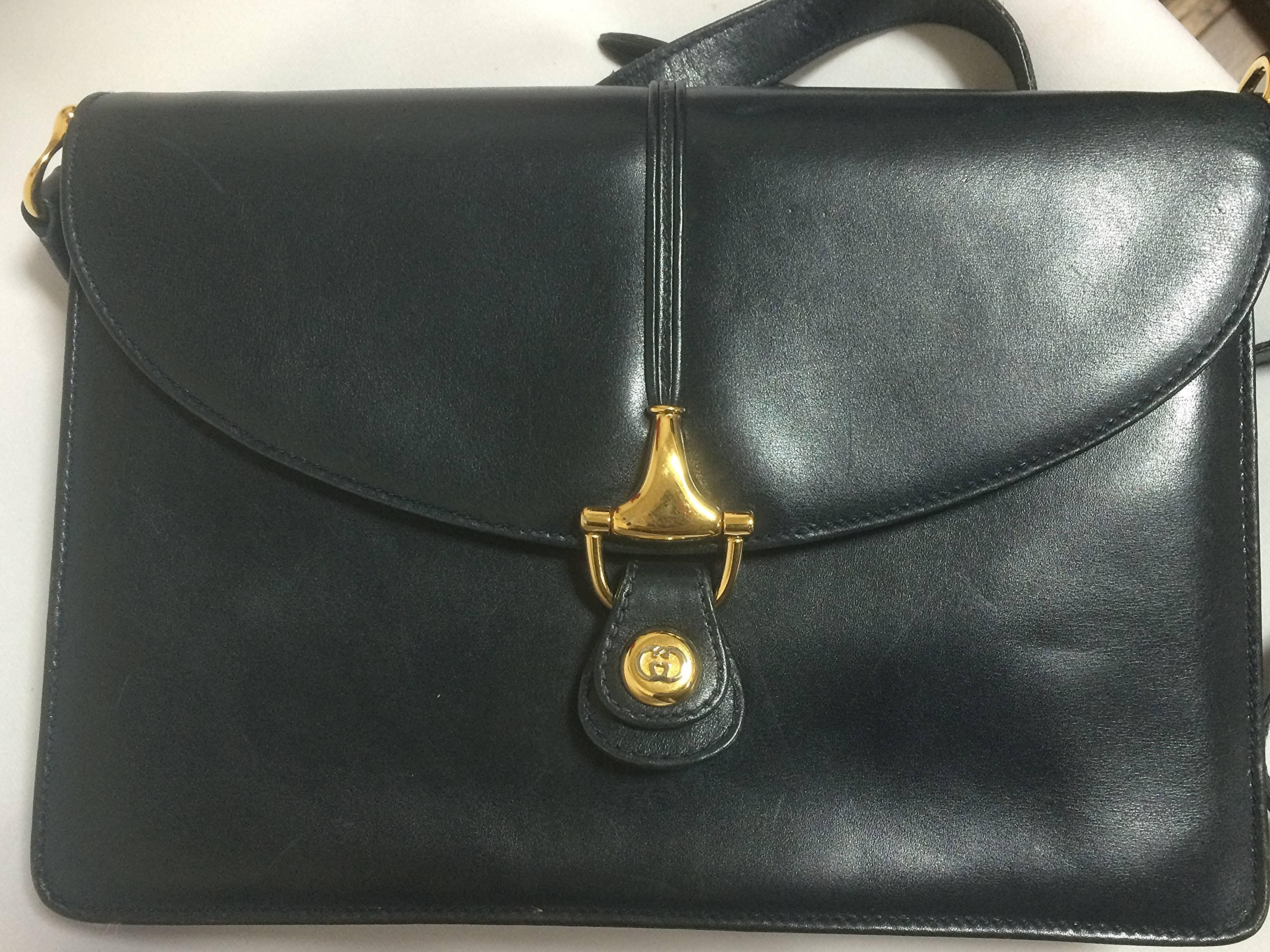 1980’s Vintage Gucci navy leather classic shoulder bag with golden horsebit logo motif closure.Elegant daily use vintage Gucci bag

Introducing a masterpiece, navy leather shoulder bag from Gucci back in the 80's.
Very sophisticated bag that
