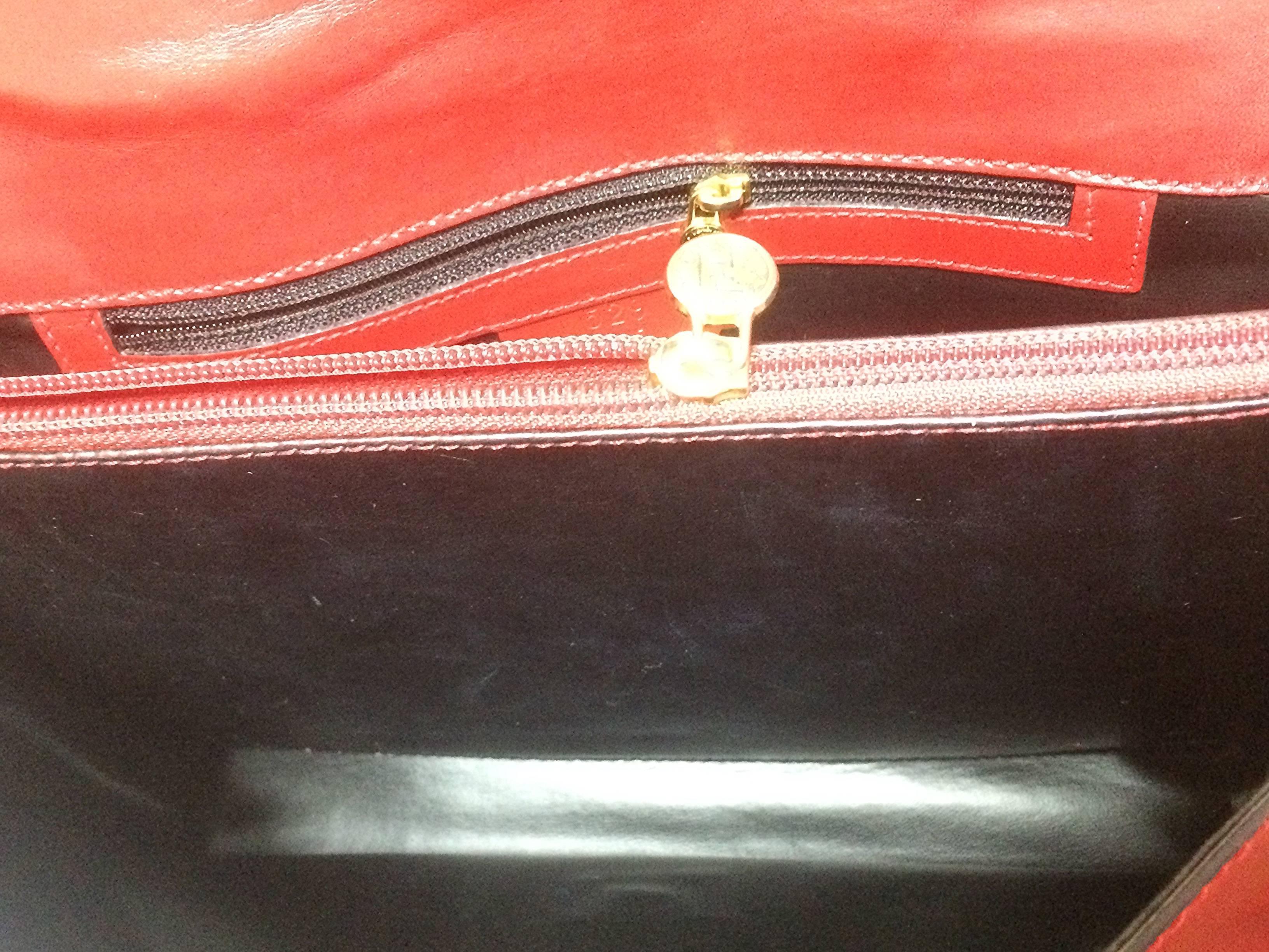 Vintage FENDI genuine red leather classic handbag with embossed Janus medallion. For Sale 3