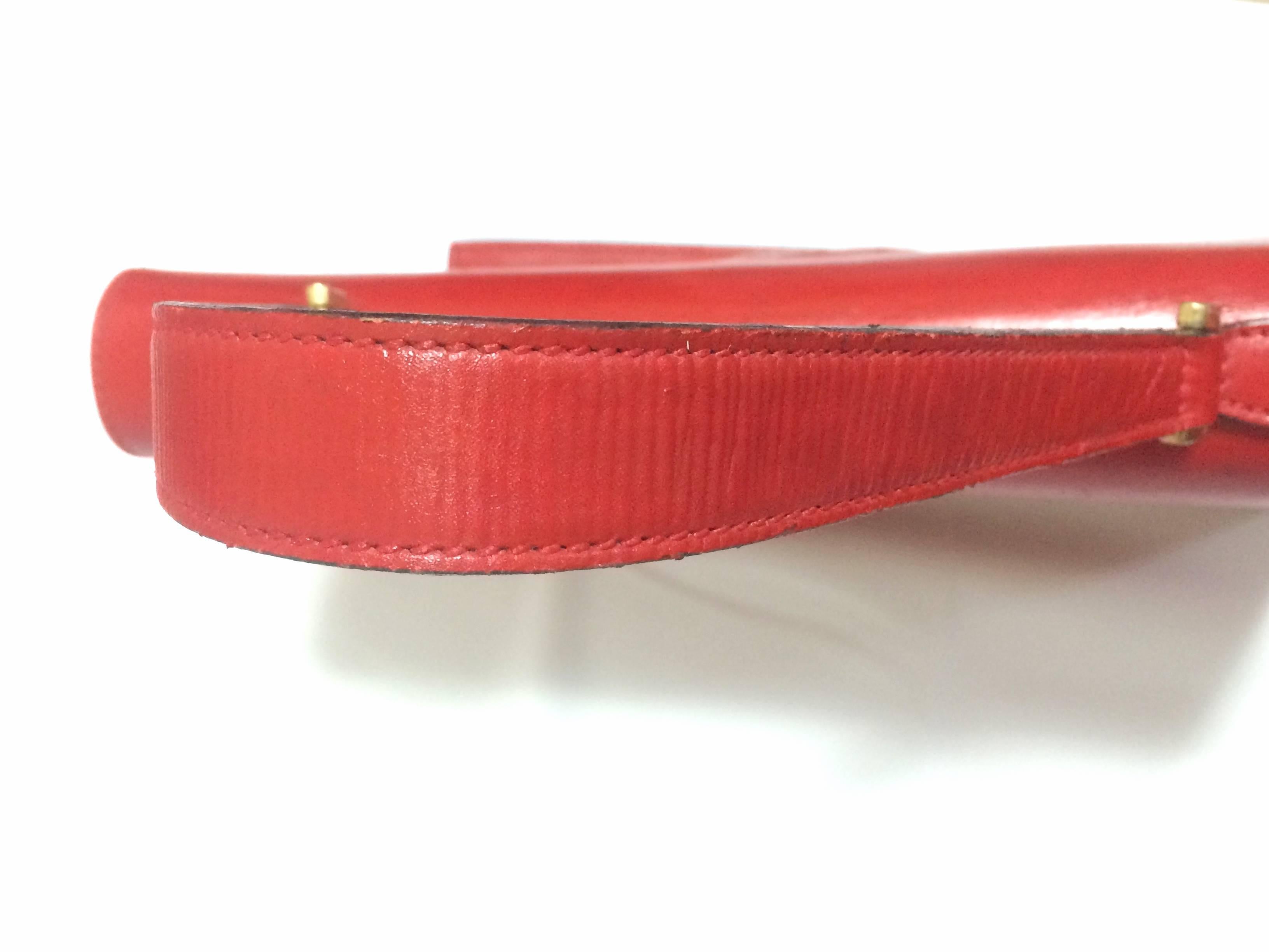 Red Vintage FENDI genuine red leather classic handbag with embossed Janus medallion. For Sale