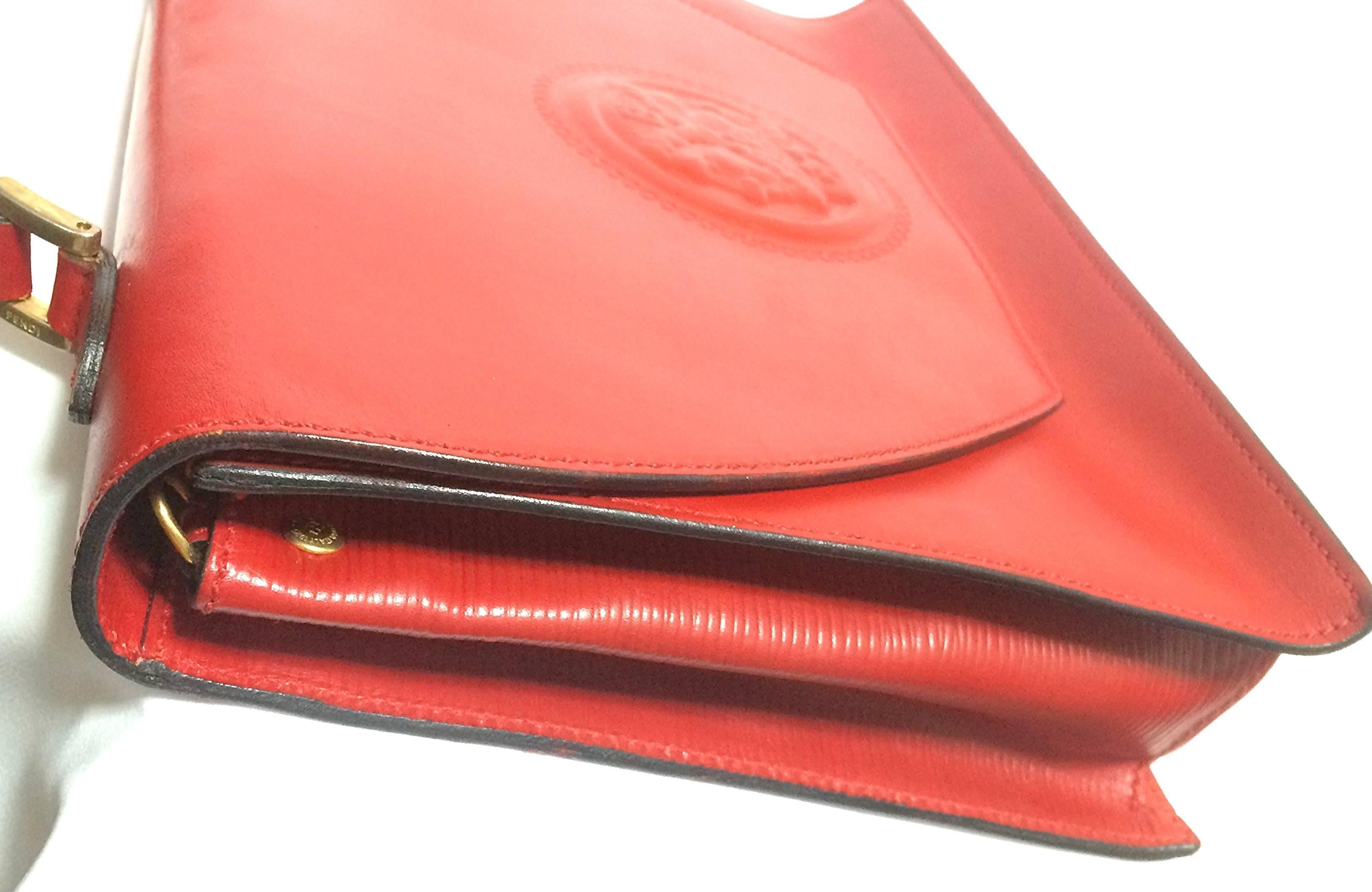 Vintage FENDI genuine red leather classic handbag with embossed Janus medallion. For Sale 1