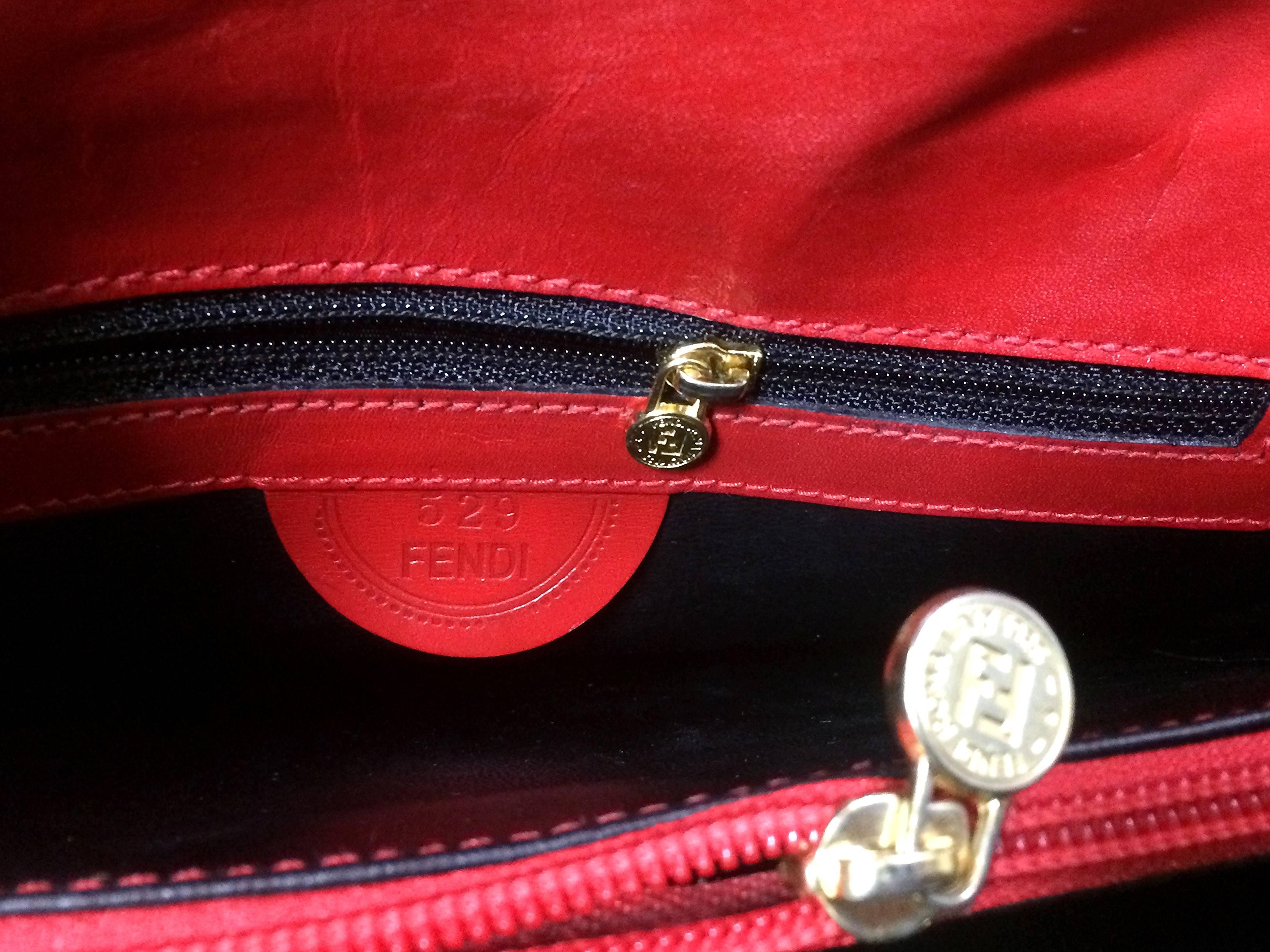 Vintage FENDI genuine red leather classic handbag with embossed Janus medallion. For Sale 2