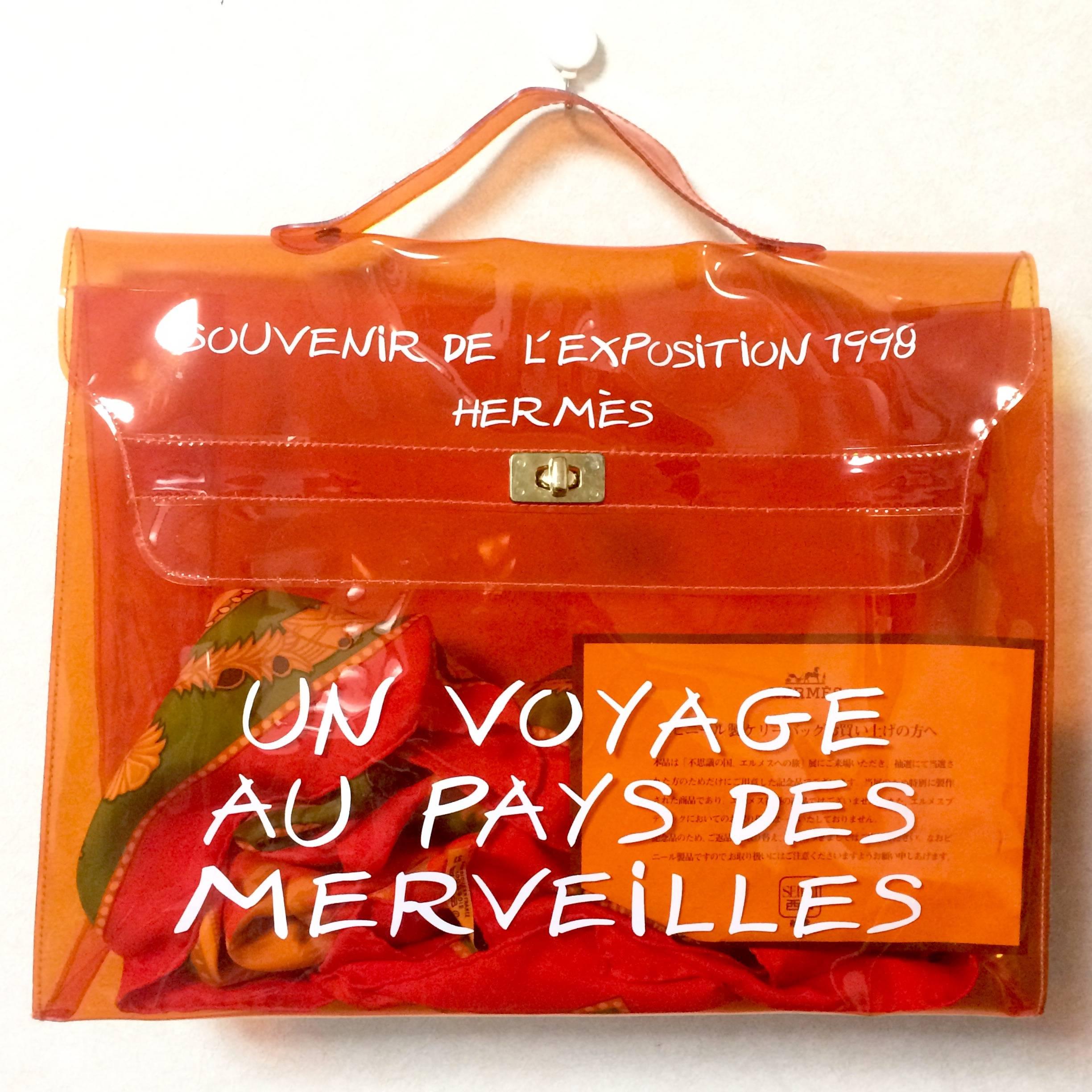 ***Scarf inside bag is for display purpose only***

**MINT condition. Hermes a rare transparent Vintage orange vinyl Kelly bag Japan Limited Edition, Japan Department Store.

SPECIAL piece for Hermes vintage collector or lover! 
Don't miss!!

This