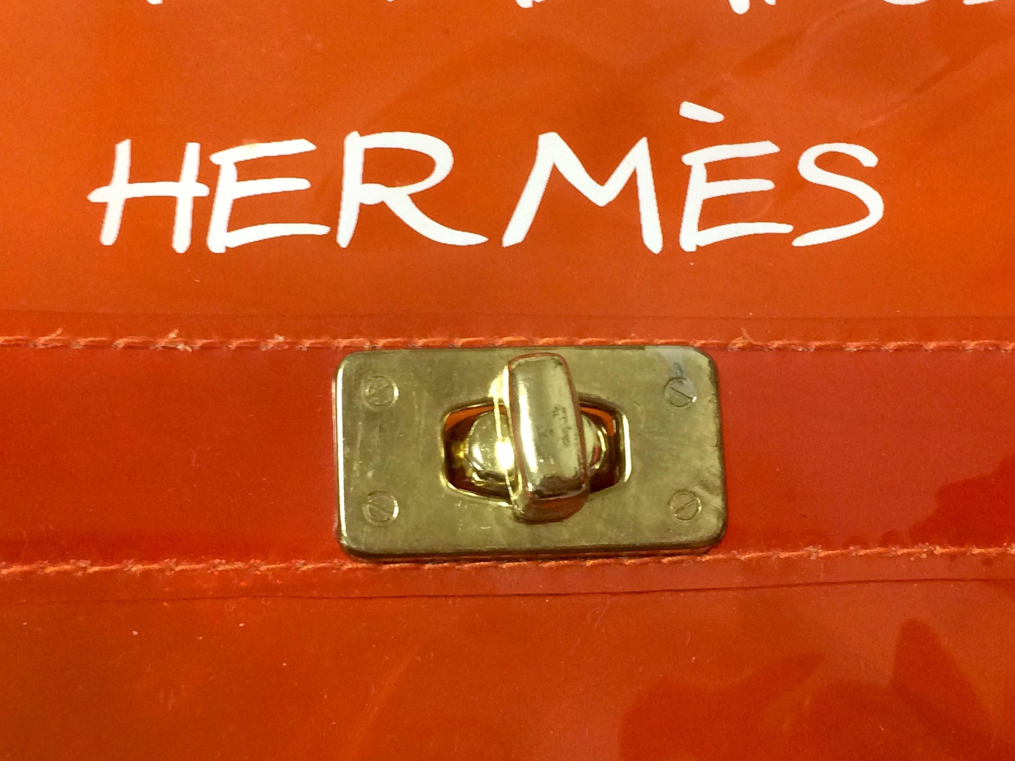 MINT condition. Hermes a rare transparent Vintage orange vinyl Kelly bag. Rare 1