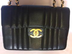 Vintage CHANEL black 2.55 jumbo caviar large shoulder bag, vertical stitches.
