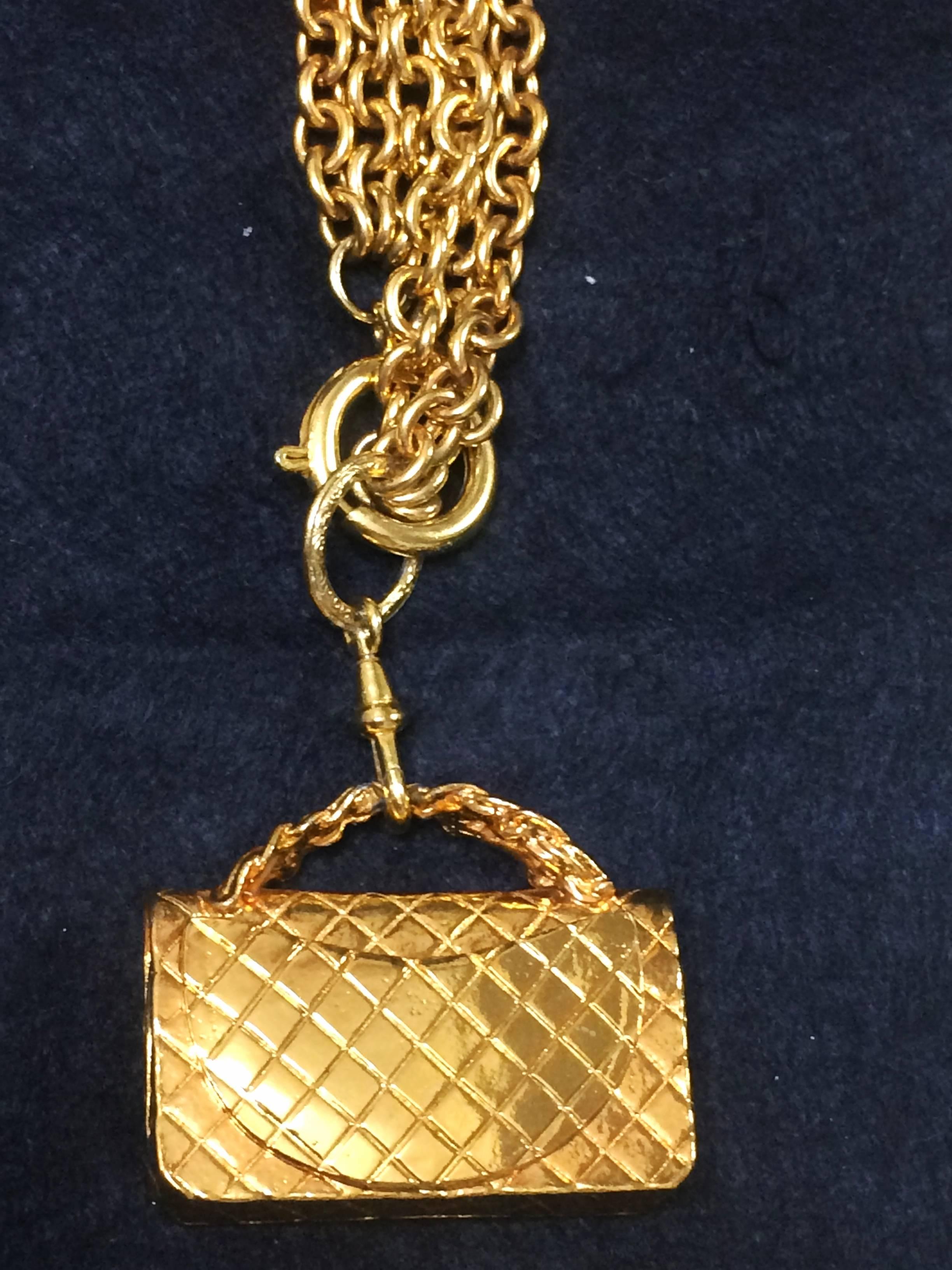 Vintage CHANEL golden double chain long necklace with classic 2.55 bag charm. 1