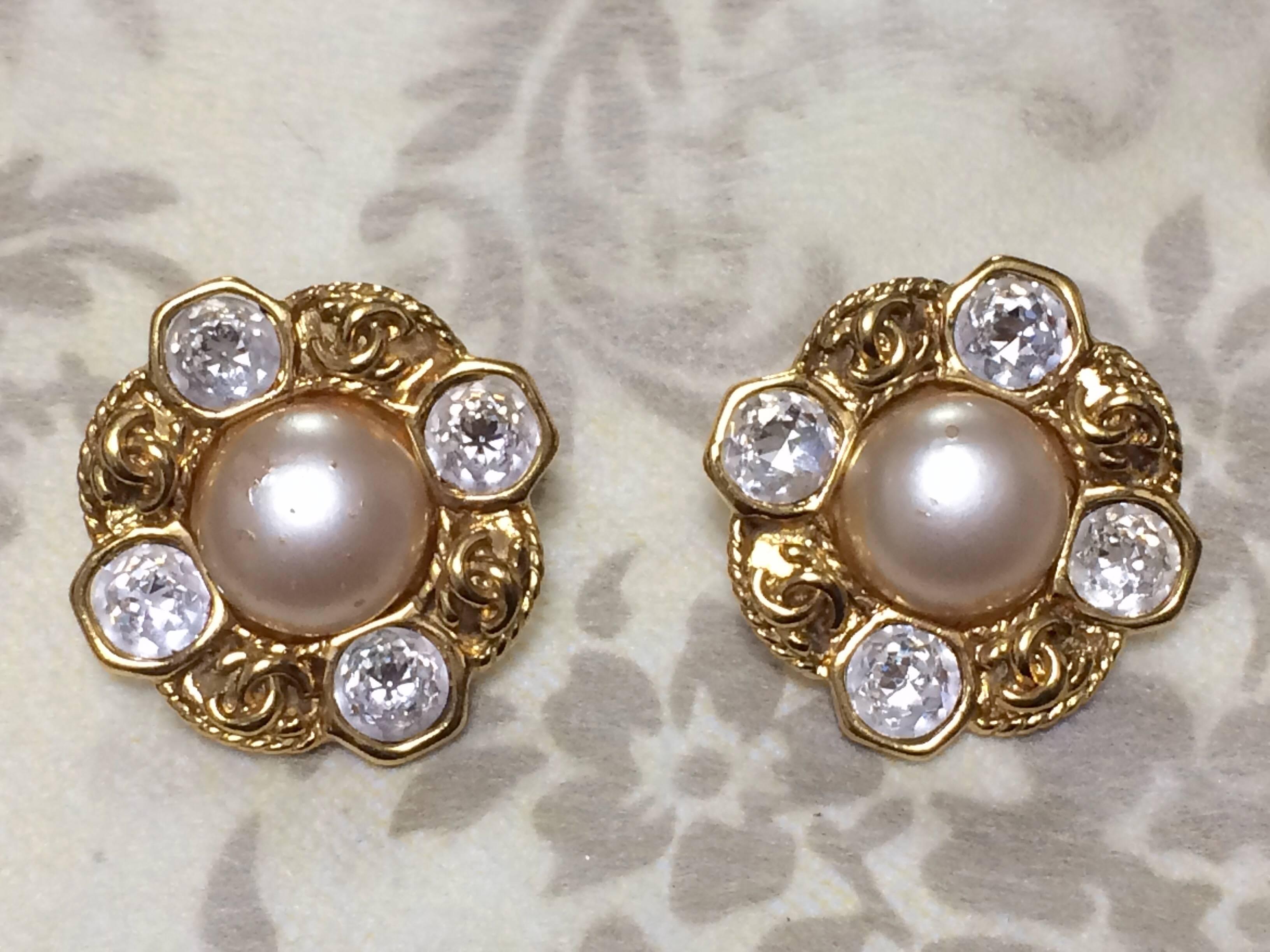 Women's Vintage CHANEL gold tone earrings with a faux pearl, Swarovski crystal stones For Sale