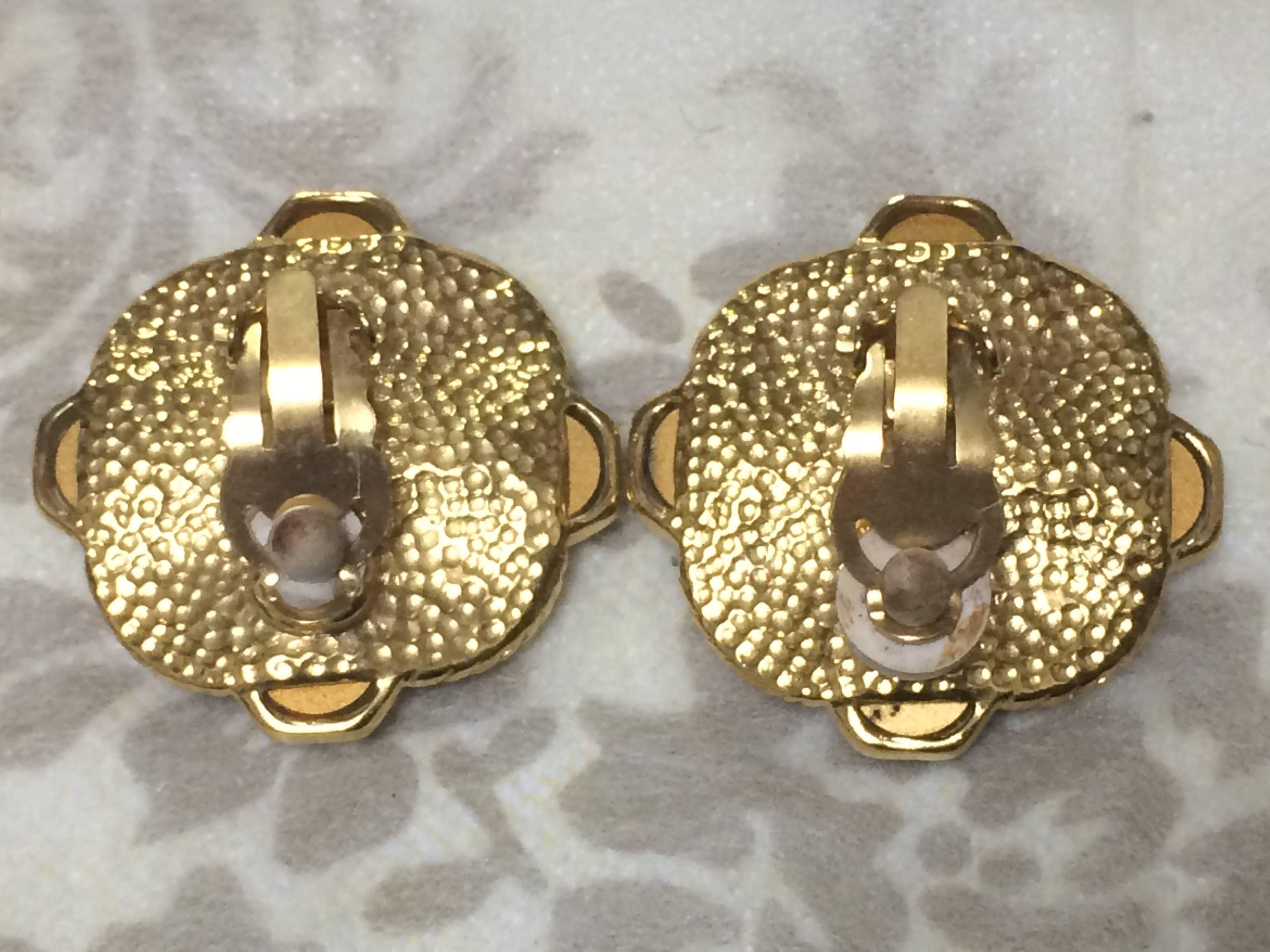 Vintage CHANEL gold tone earrings with a faux pearl, Swarovski crystal stones For Sale 1
