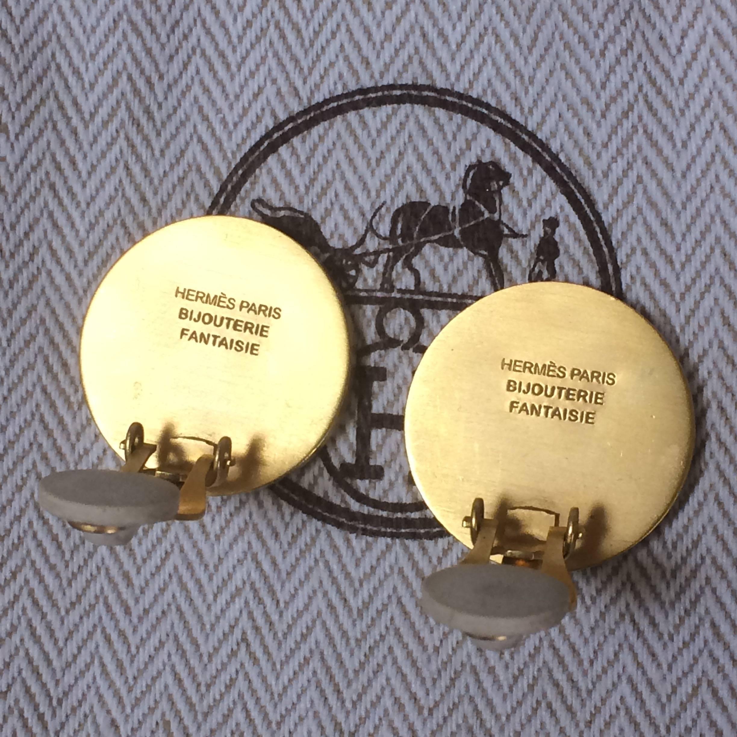 Women's or Men's Vintage HERMES golden logo embossed genuine shell earrings.Bijouterie Fantaisie For Sale