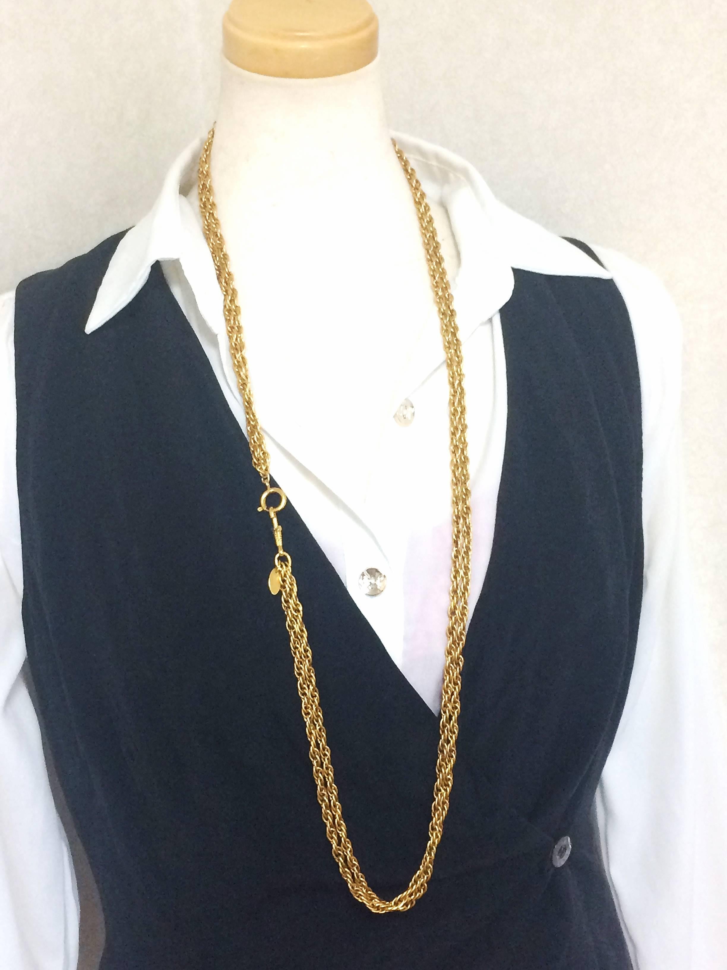 1990s. Vintage CHANEL double golden skinny chain long necklace. Classic and simple necklace. 

Introducing a classic and simple necklace from CHANEL back in the 90's, golden skinny double chain necklace.

Featuring a hock that you can also
