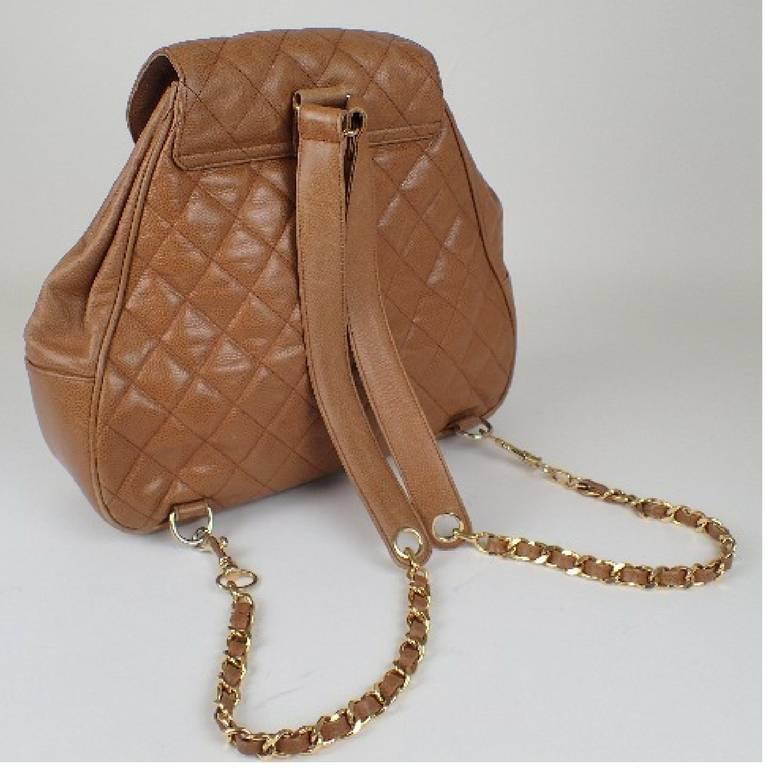 1990s. Vintage CHANEL quilted brown caviar leather backpack with gold chain straps.

Rare color as backpack in caviar leather from CHANEL back in the 90's.  Don't miss it!

Introducing another vintage FAB piece,  a compact size backpack in brown