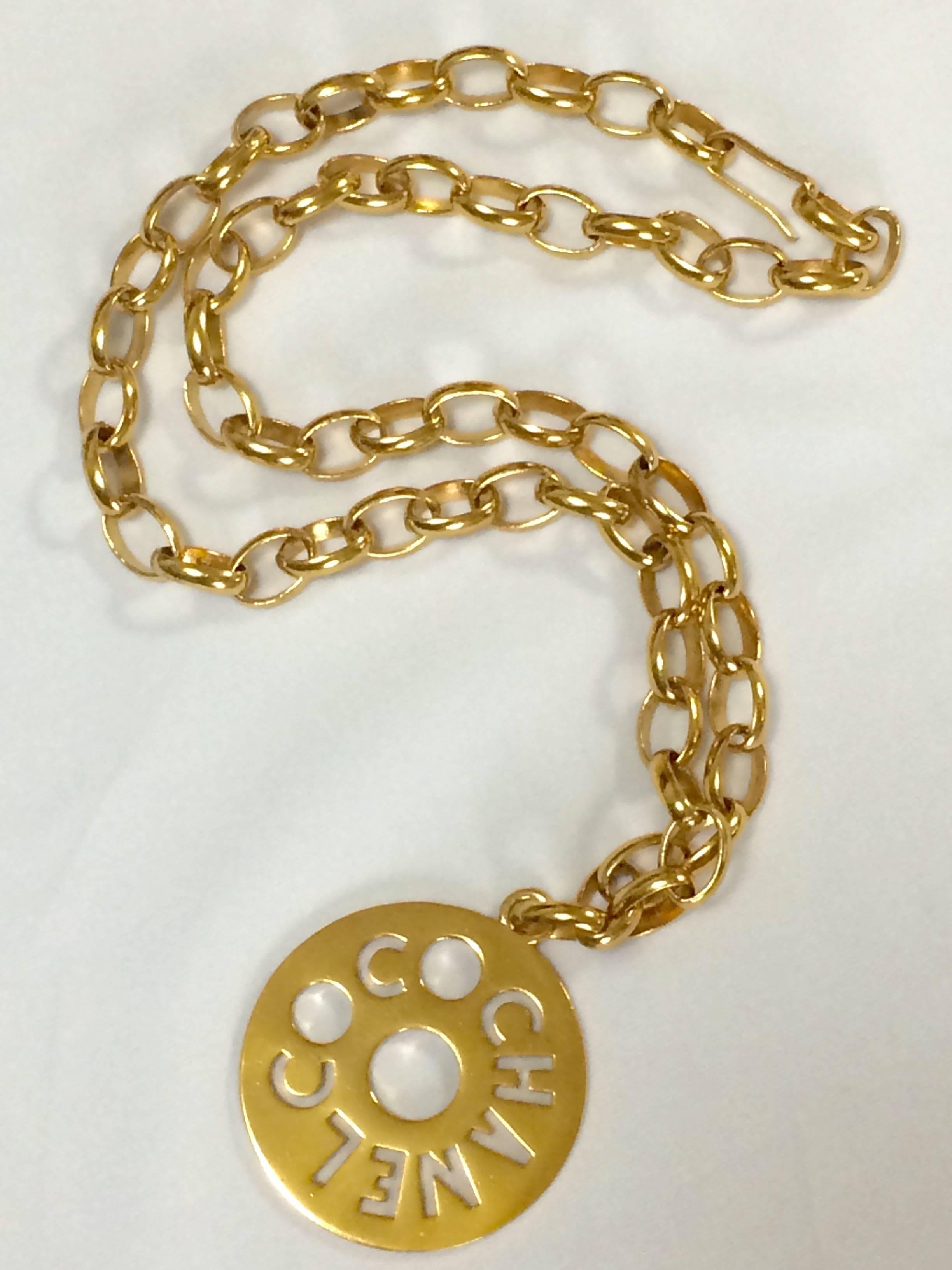Women's Vintage CHANEL golden chain necklace, chain belt with round logo COCO top.