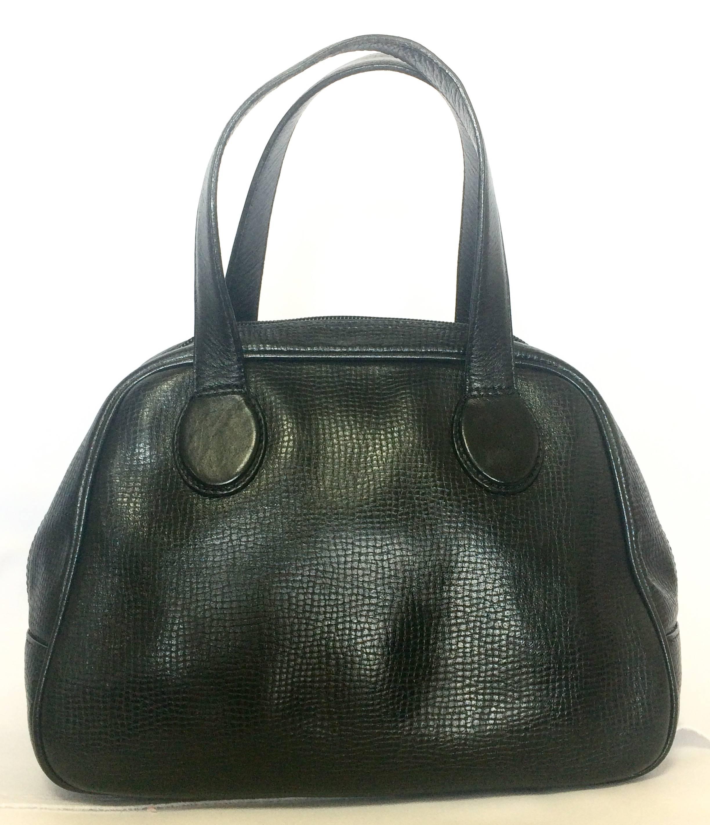 Black Vintage Christian Dior black leather mini bolide style handbag with logo motif.