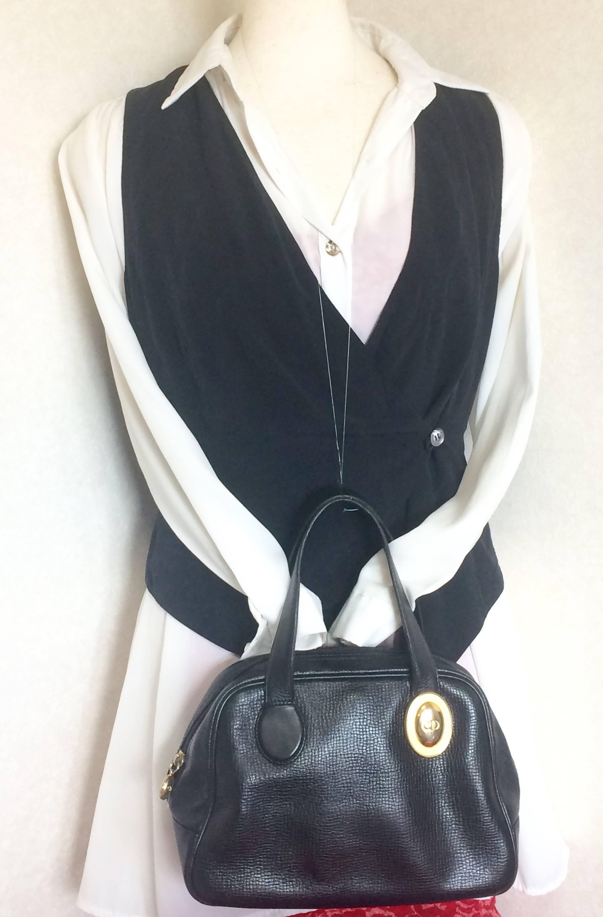 Vintage Christian Dior black leather mini bolide style handbag with logo motif. 5