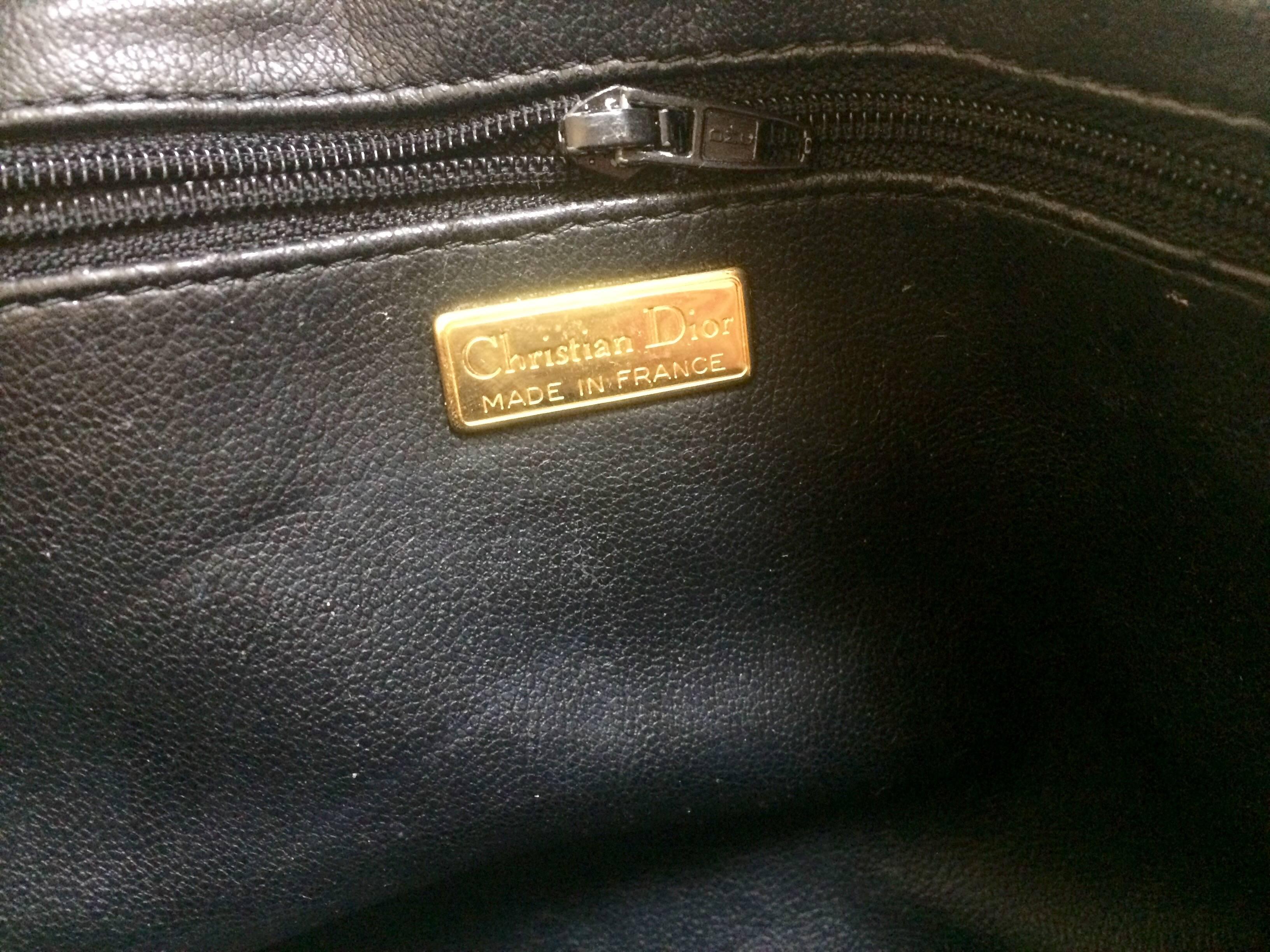Vintage Christian Dior black leather mini bolide style handbag with logo motif. 4