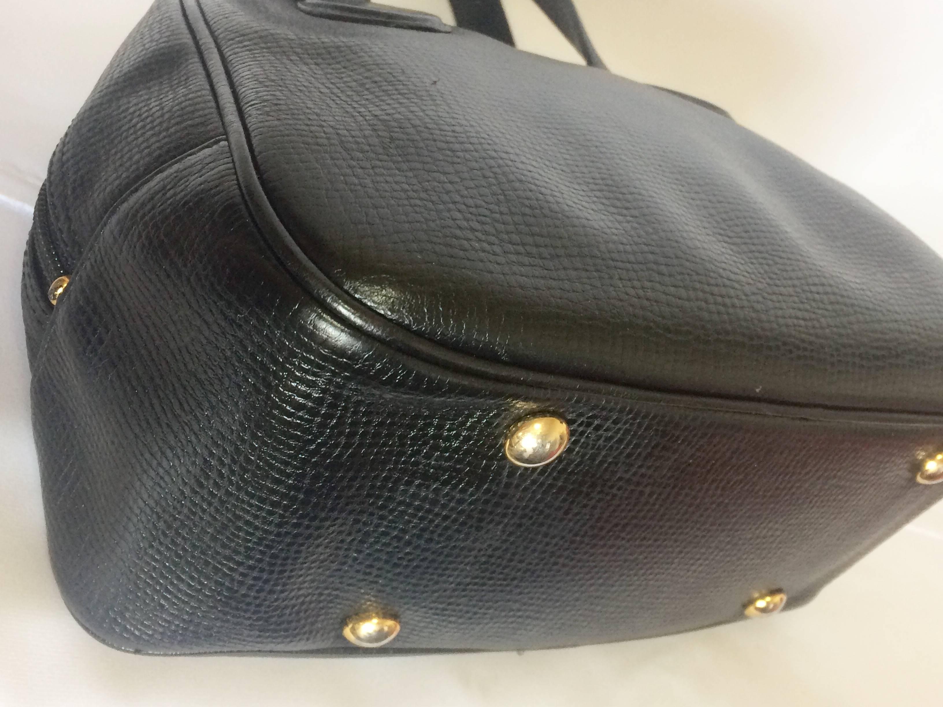 Vintage Christian Dior black leather mini bolide style handbag with logo motif. 2