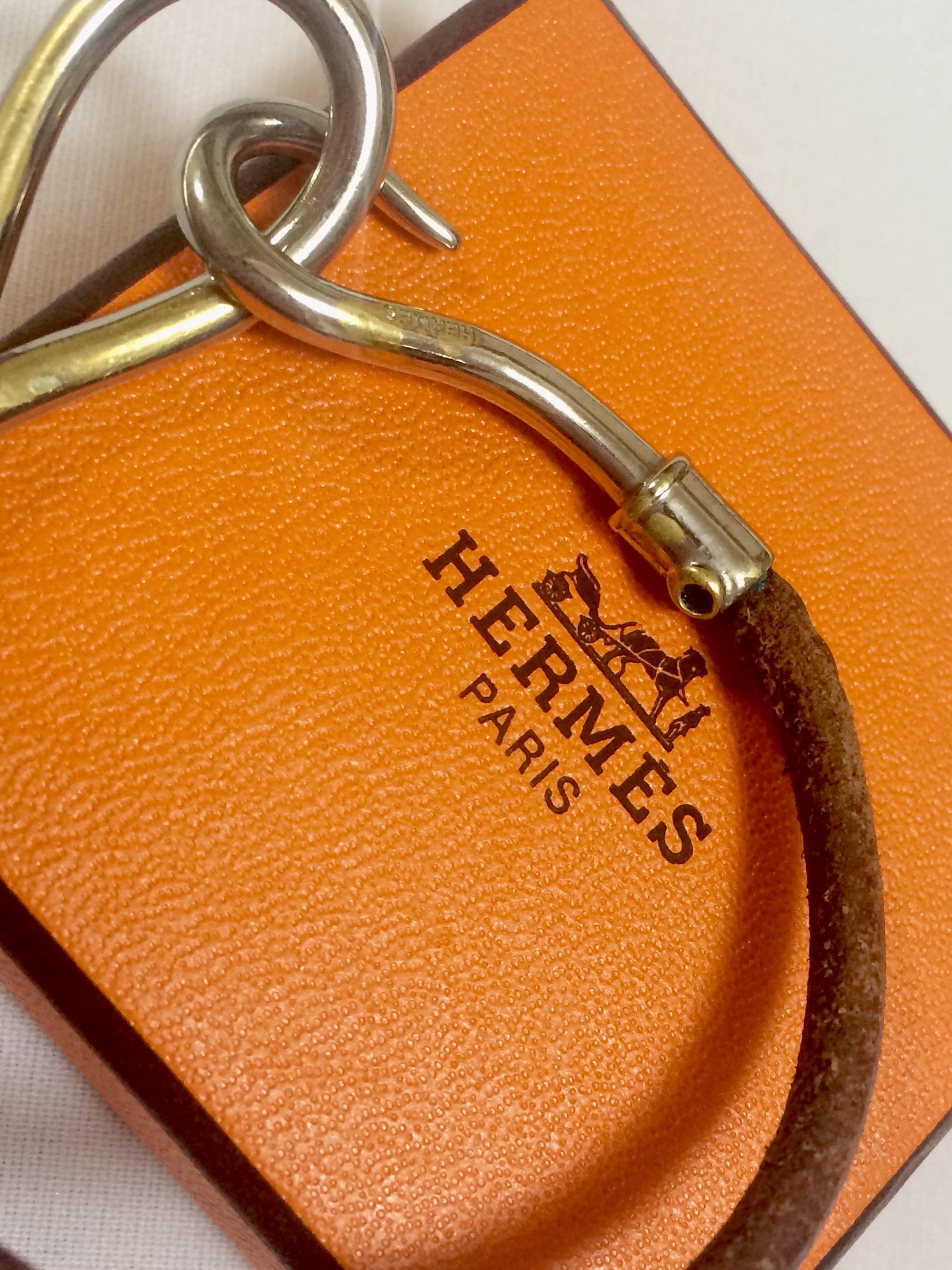 Women's or Men's Vintage Hermes Jumbo leather and silver bracelet. Classic and casual jewelry For Sale