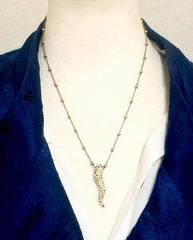 Vintage Dolce and Gabbana golden ball chain necklace with fire frame pendant top