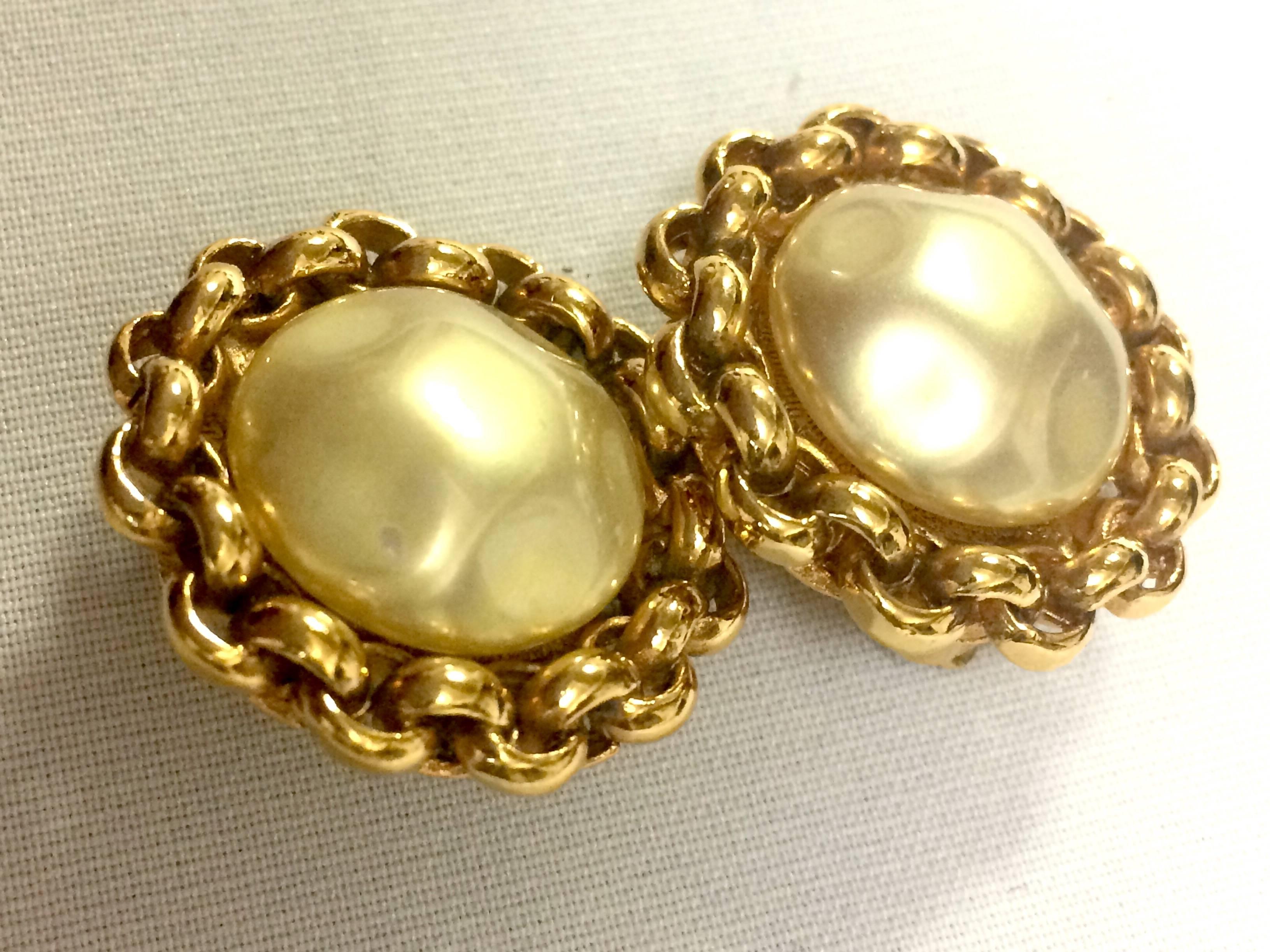 Vintage CHANEL classic simple earrings with large faux pearl and chain frames 1