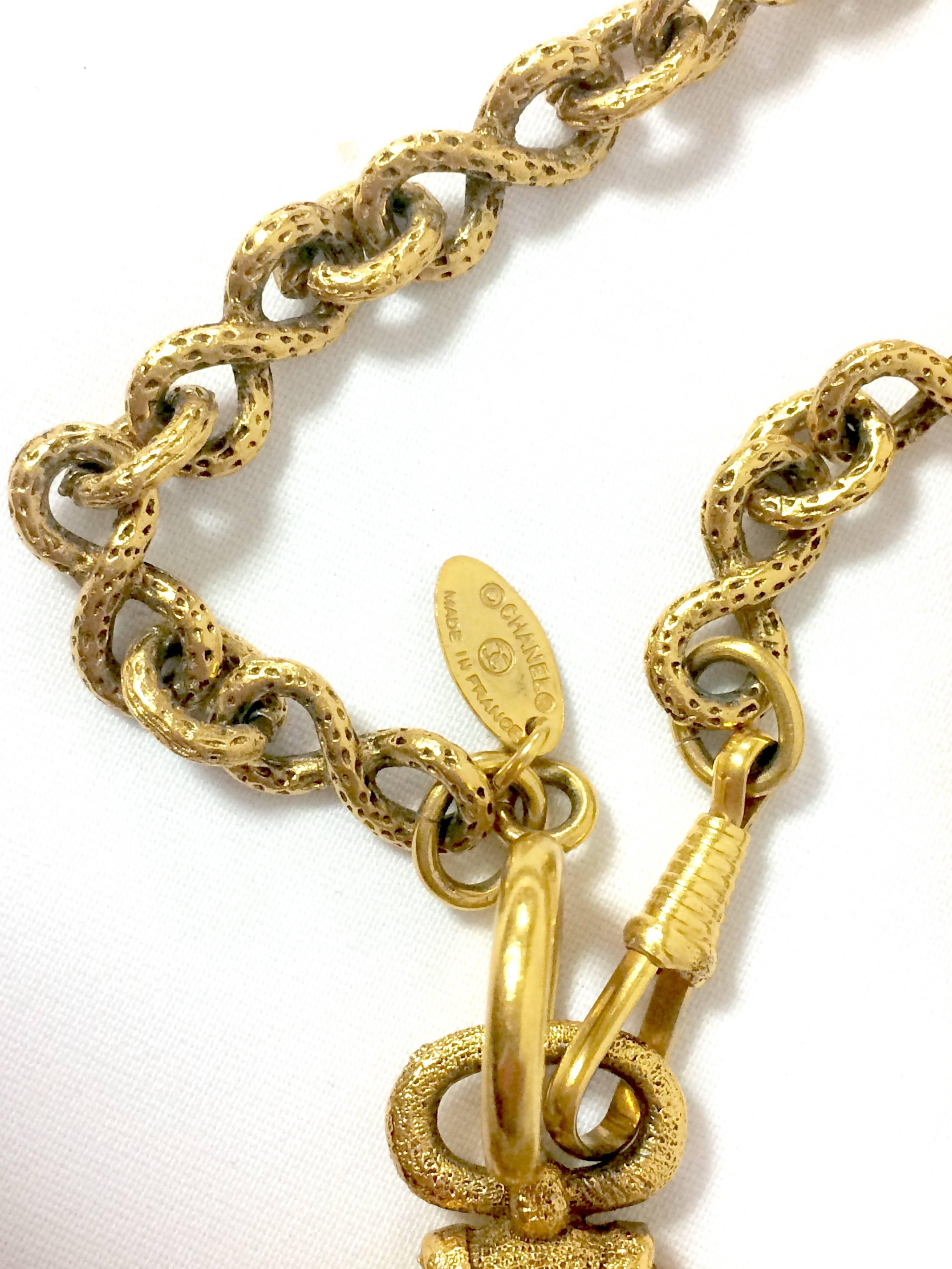 Vintage CHANEL long chain necklace with round glass loupe pendant top and CC. 3