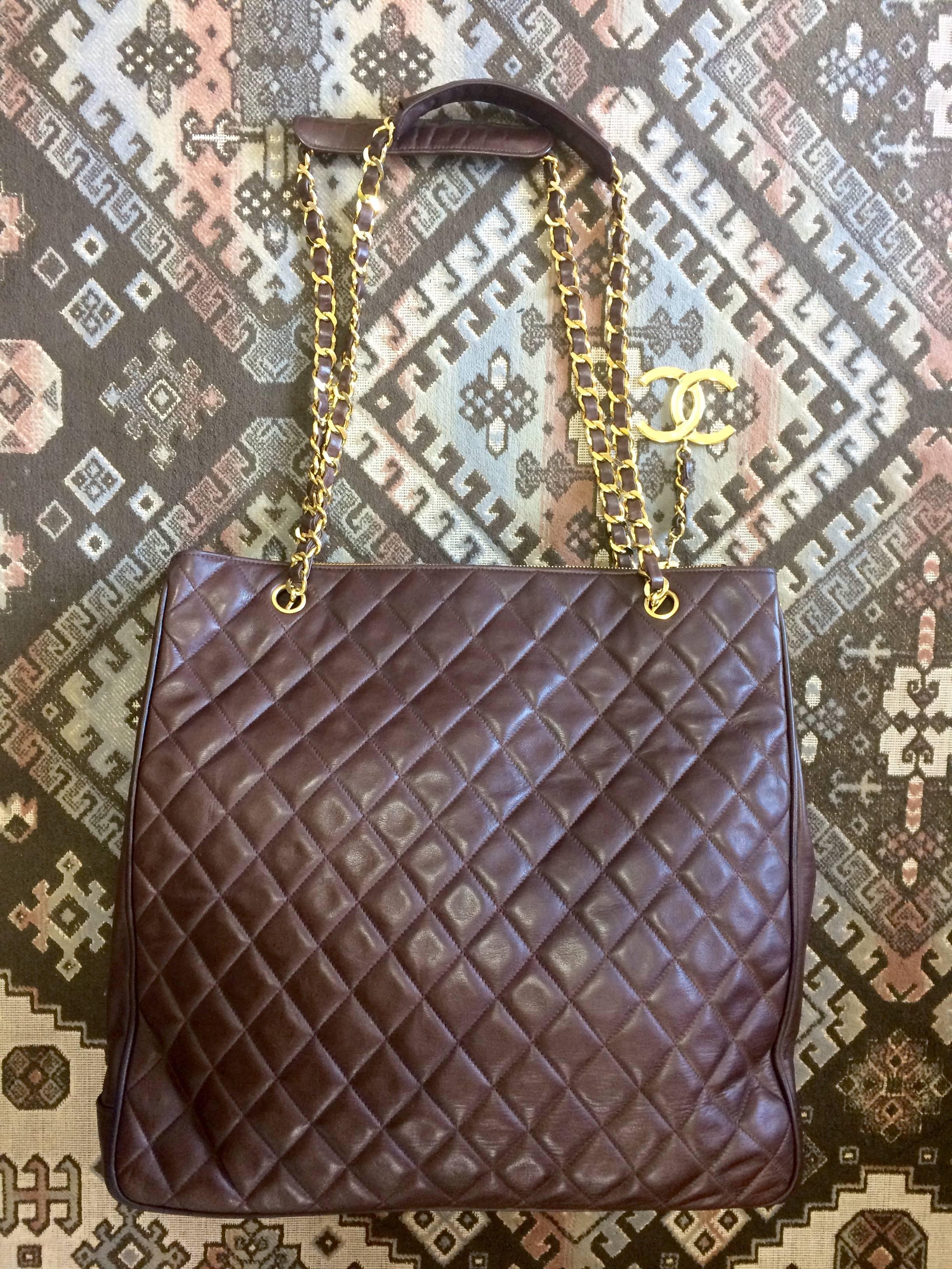 Vintage CHANEL brown lambskin large tote bag with gold tone chains and CC charm. For Sale 4