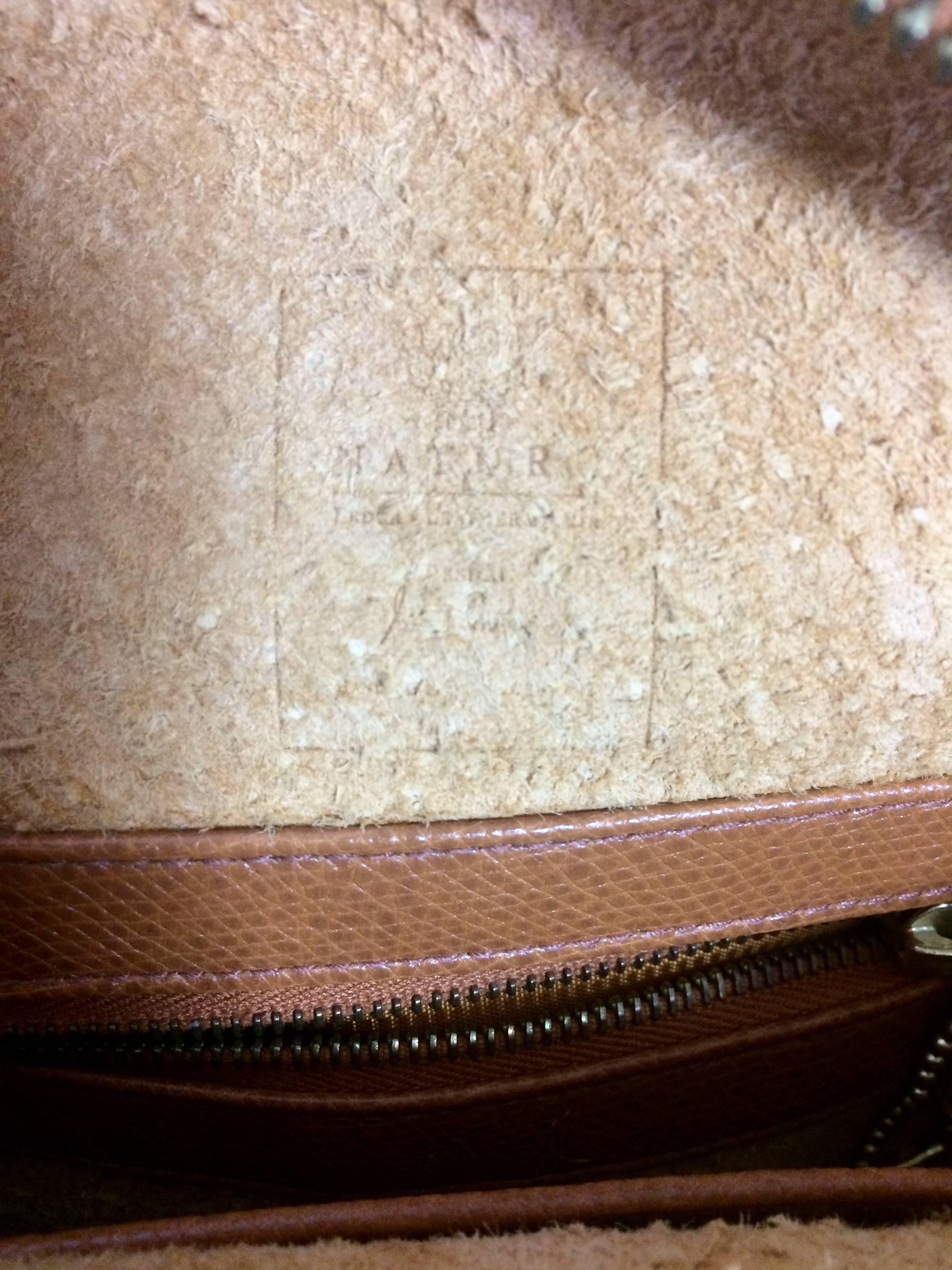 Women's or Men's MINT. Vintage MCM brown grained leather logo studs round shoulder bag. Suzy Wong