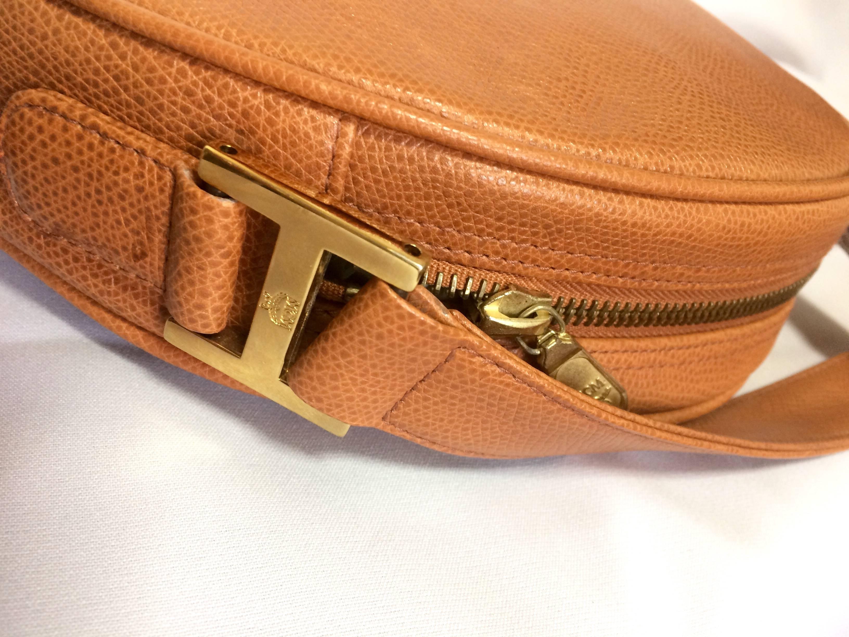 Brown MINT. Vintage MCM brown grained leather logo studs round shoulder bag. Suzy Wong