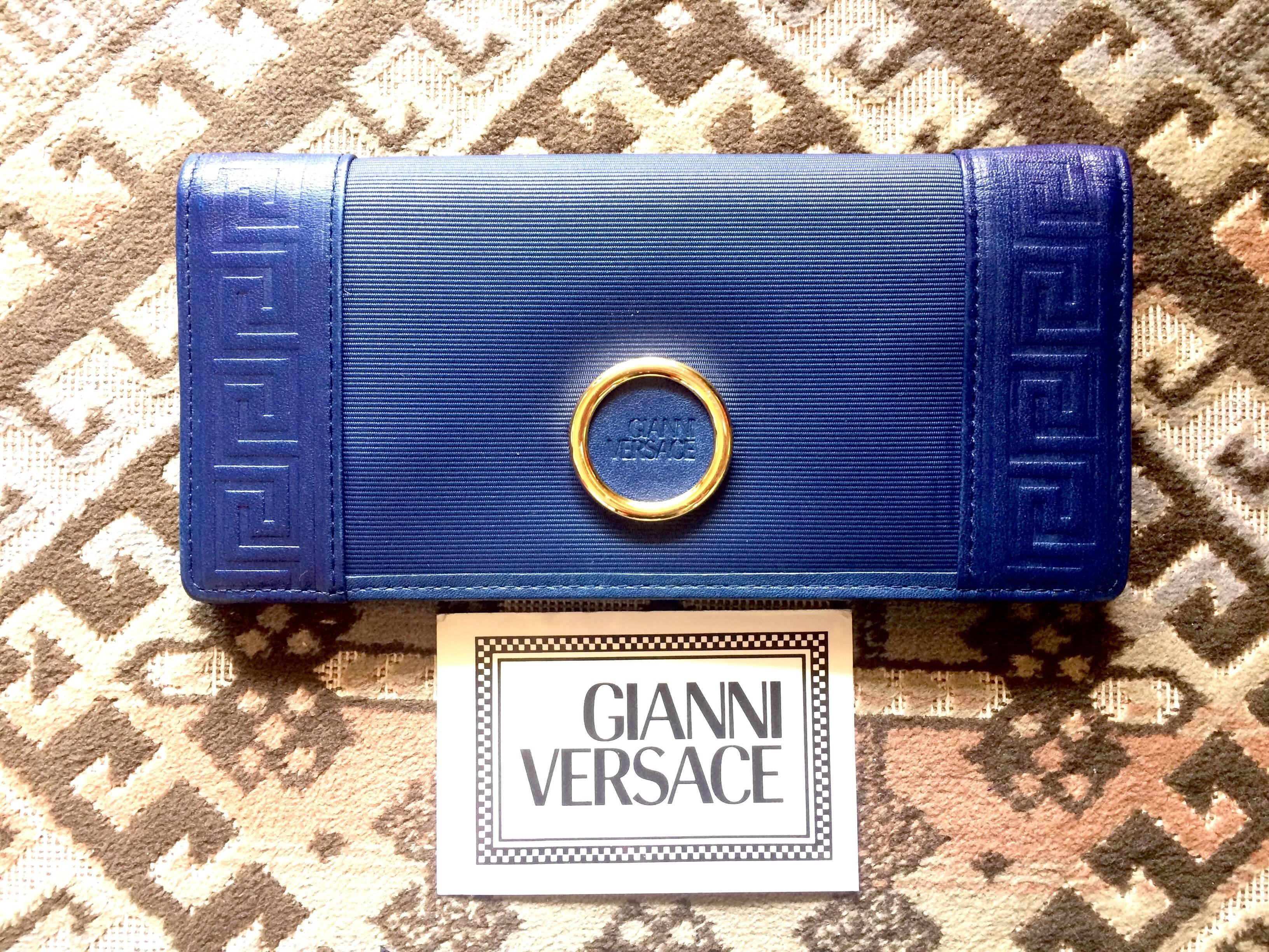 Vintage Gianni Versace blue wallet with geometric pattern and logo round motif. 5