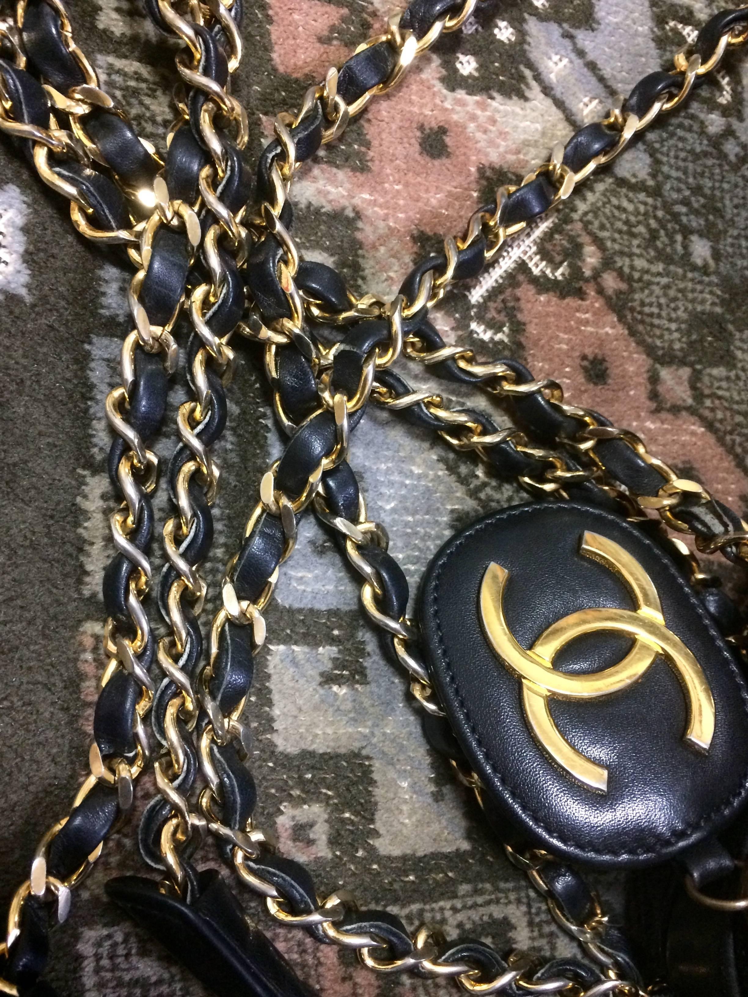 Vintage CHANEL black goatskin shoulder bag with gold tone chains and cc charm. For Sale 2
