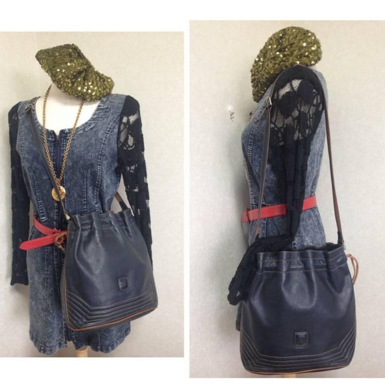 Vintage Celine navy and brown leather hobo bucket shoulder bag with drawstrings. 5