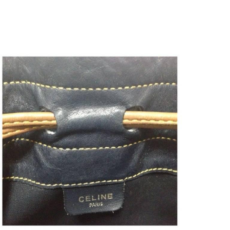 Vintage Celine navy and brown leather hobo bucket shoulder bag with drawstrings. 2