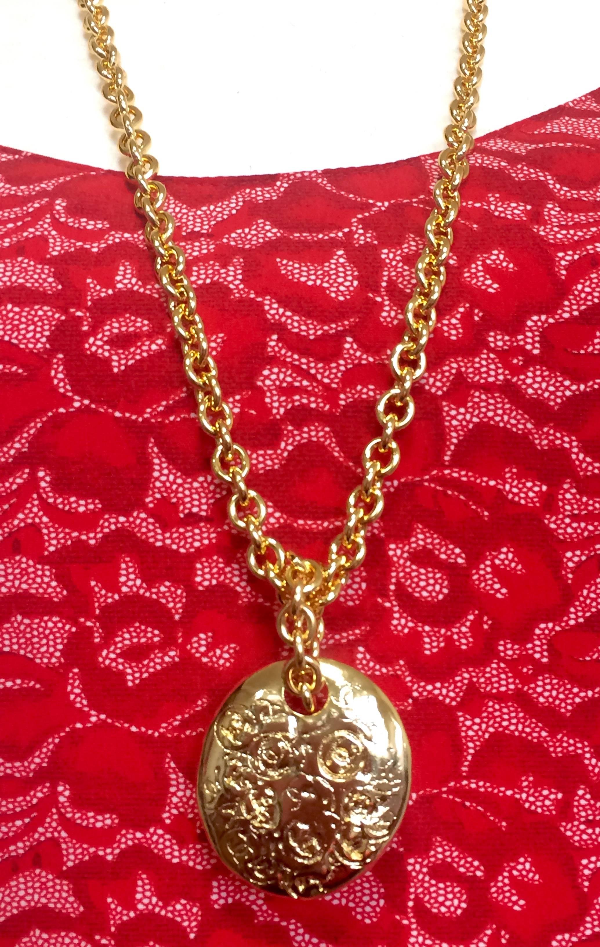 MINT. Vintage CHANEL golden long chain necklace with round coin, medal shape top 3